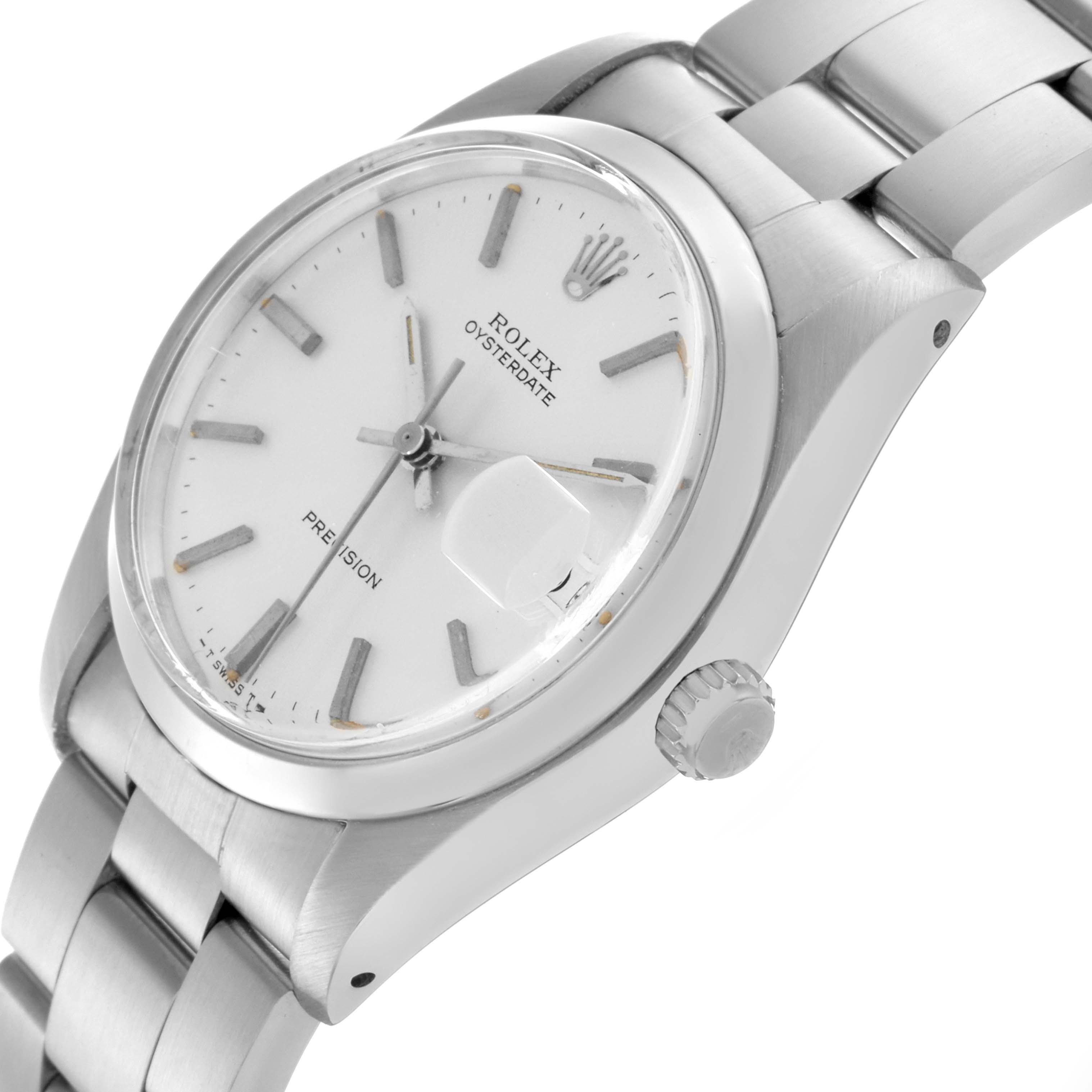 The Rolex Date 6694 Men's Stainless Steel Silver Dial 6694 Men's Stainless Steel Silver Dial model watch is shown at an angled side view, highlighting the dial, crown, and bracelet links.