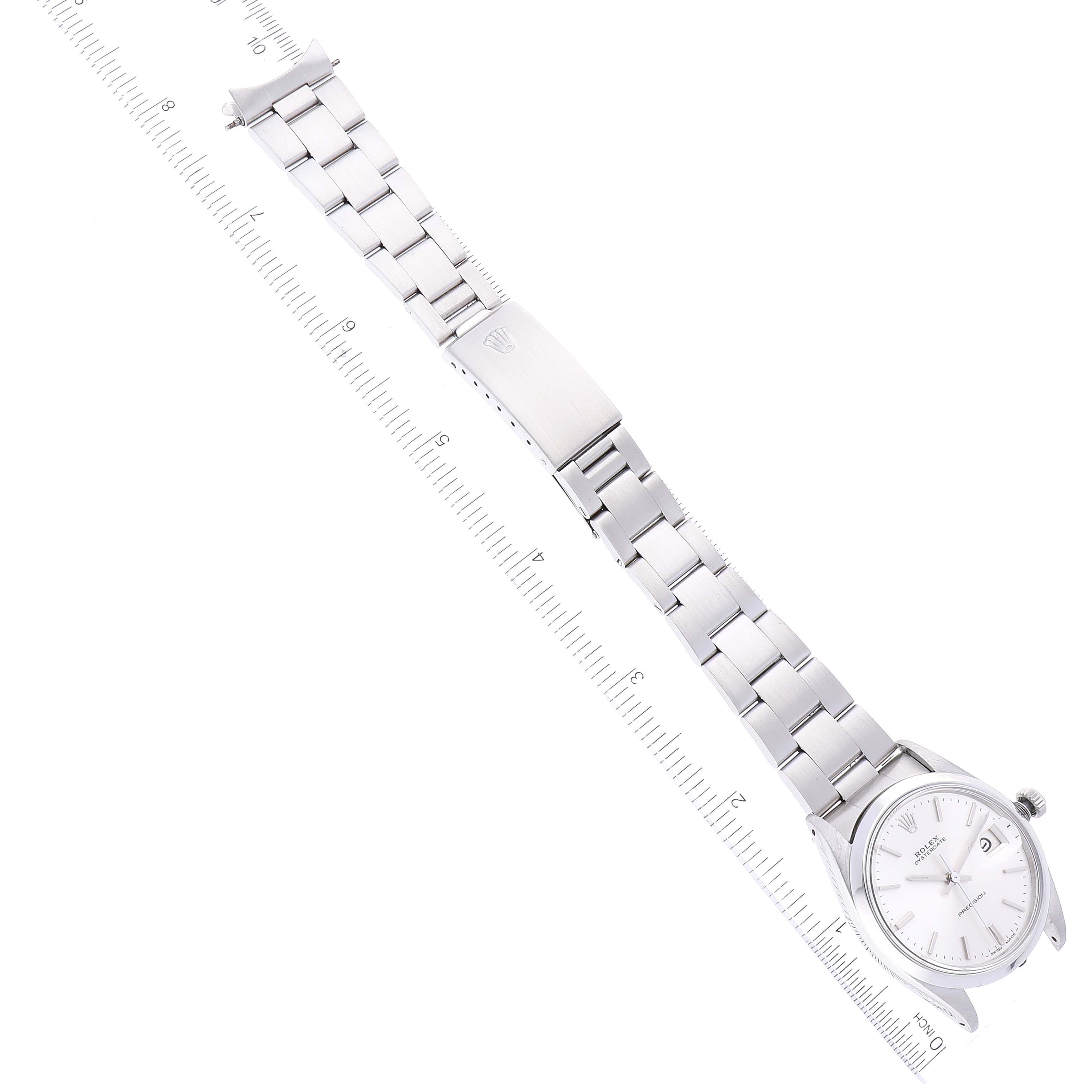 The Rolex Vintage Collection 6694 Men's Stainless Steel Silver Dial 6694 Men's Stainless Steel Silver Dial watch is shown flat with the bracelet extended, revealing the face, clasp, and full bracelet links.