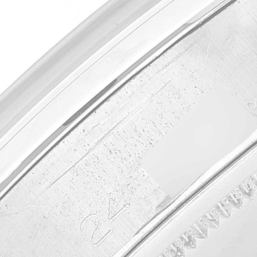This image shows a close-up of the case back of a Vintage Collection model by Rolex, highlighting the engraved text and details.