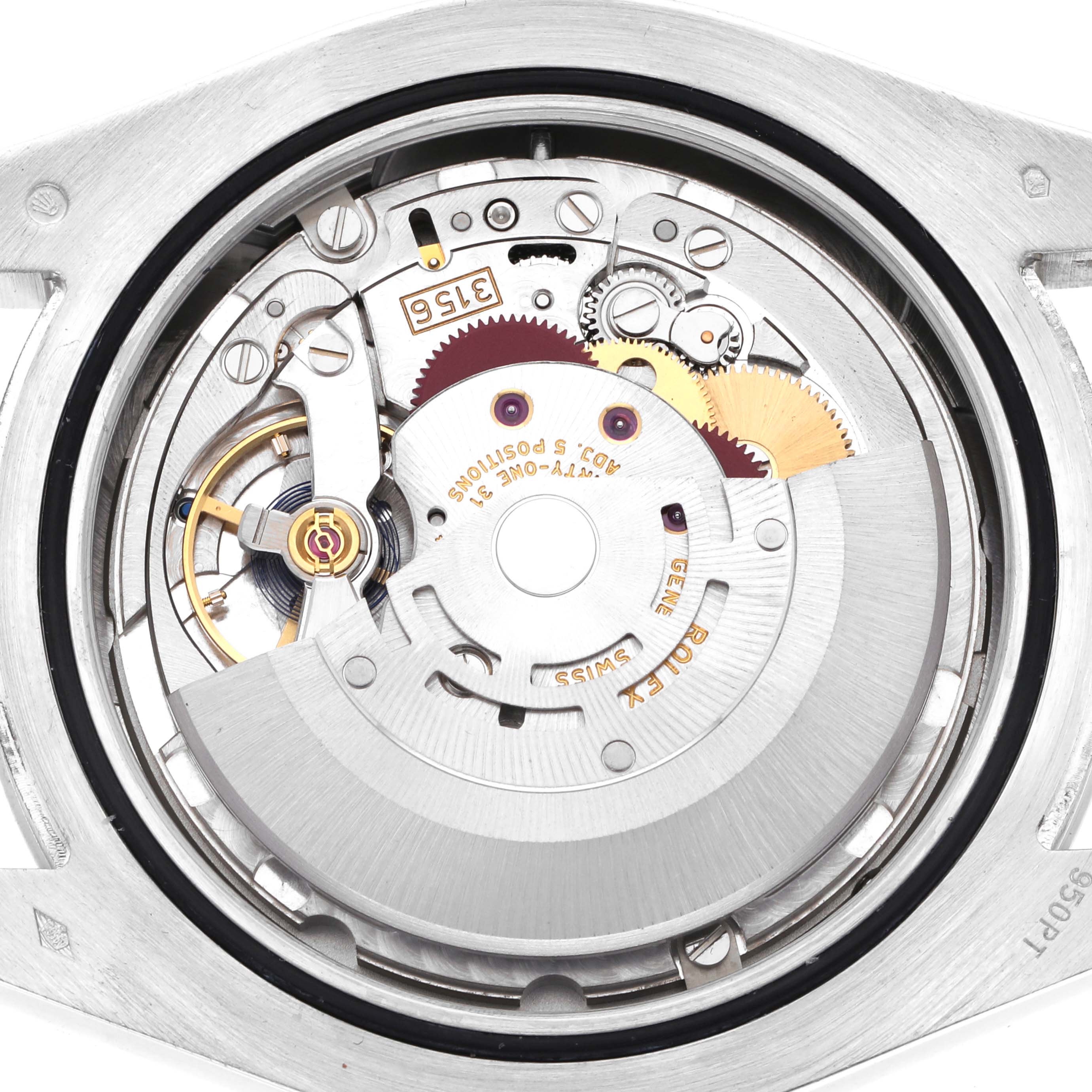 The image shows the movement of a Rolex President 218206 Men's Platinum Blue Dial watch, viewed from the back, revealing gears and components.