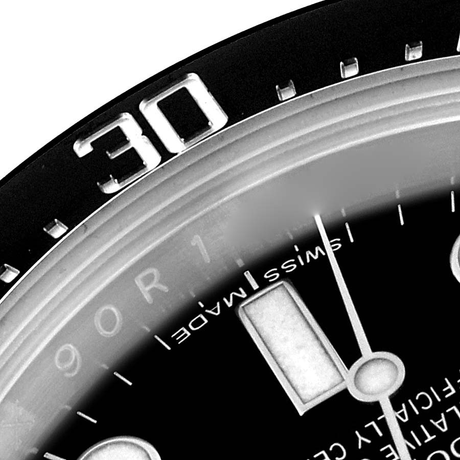 The image shows a close-up of the dial and bezel of a Rolex Sea-Dweller 116600 Men
s Stainless Steel Black Dial 116600 Men
s Stainless Steel Black Dial watch, highlighting the 30-minute marker.