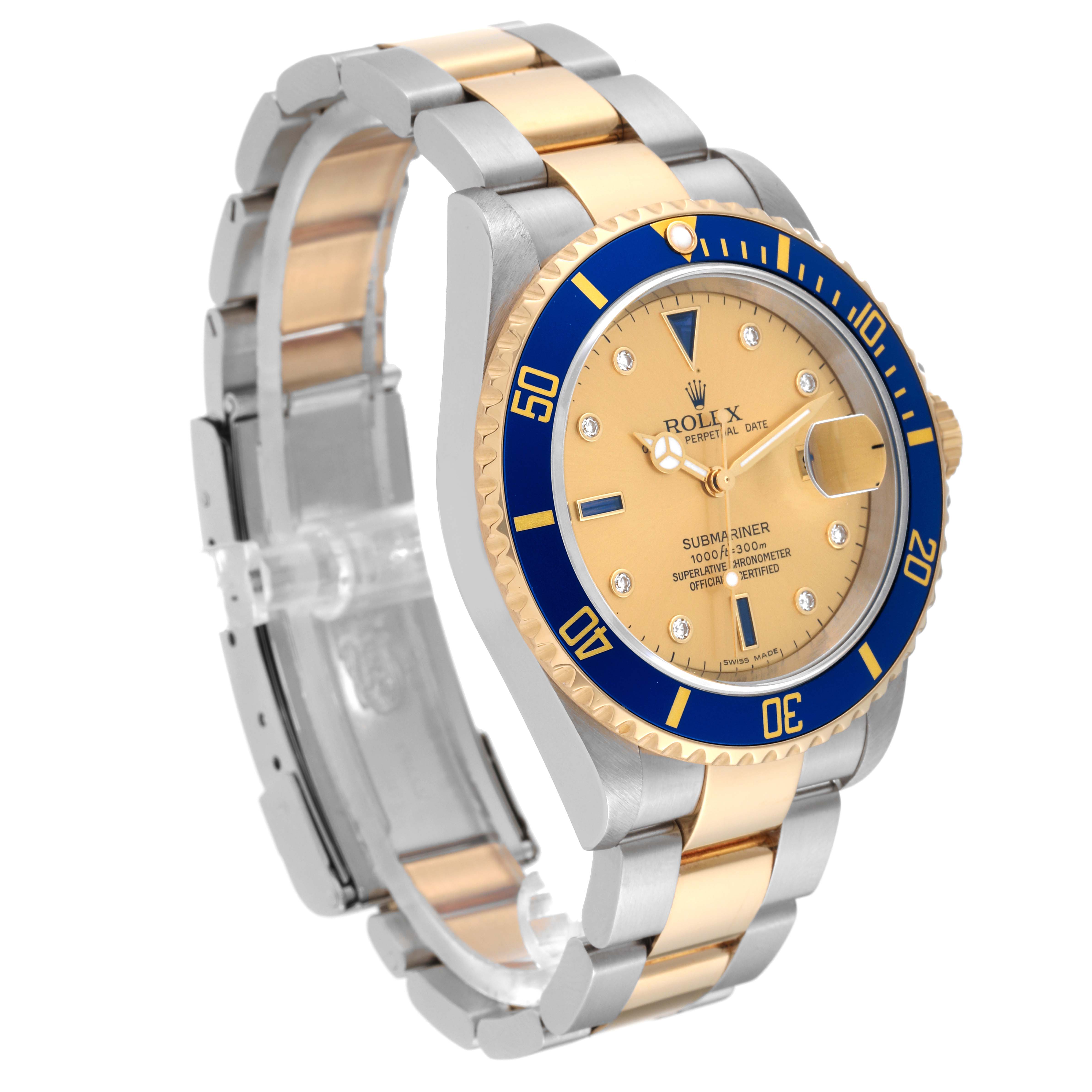 The image shows the Rolex Submariner 16613LB Men's Steel and Gold (two tone) Champagne Dial 16613LB Men's Steel and Gold (two tone) Champagne Dial watch at a three-quarter angle, highlighting the bezel, dial, bracelet, and clasp.