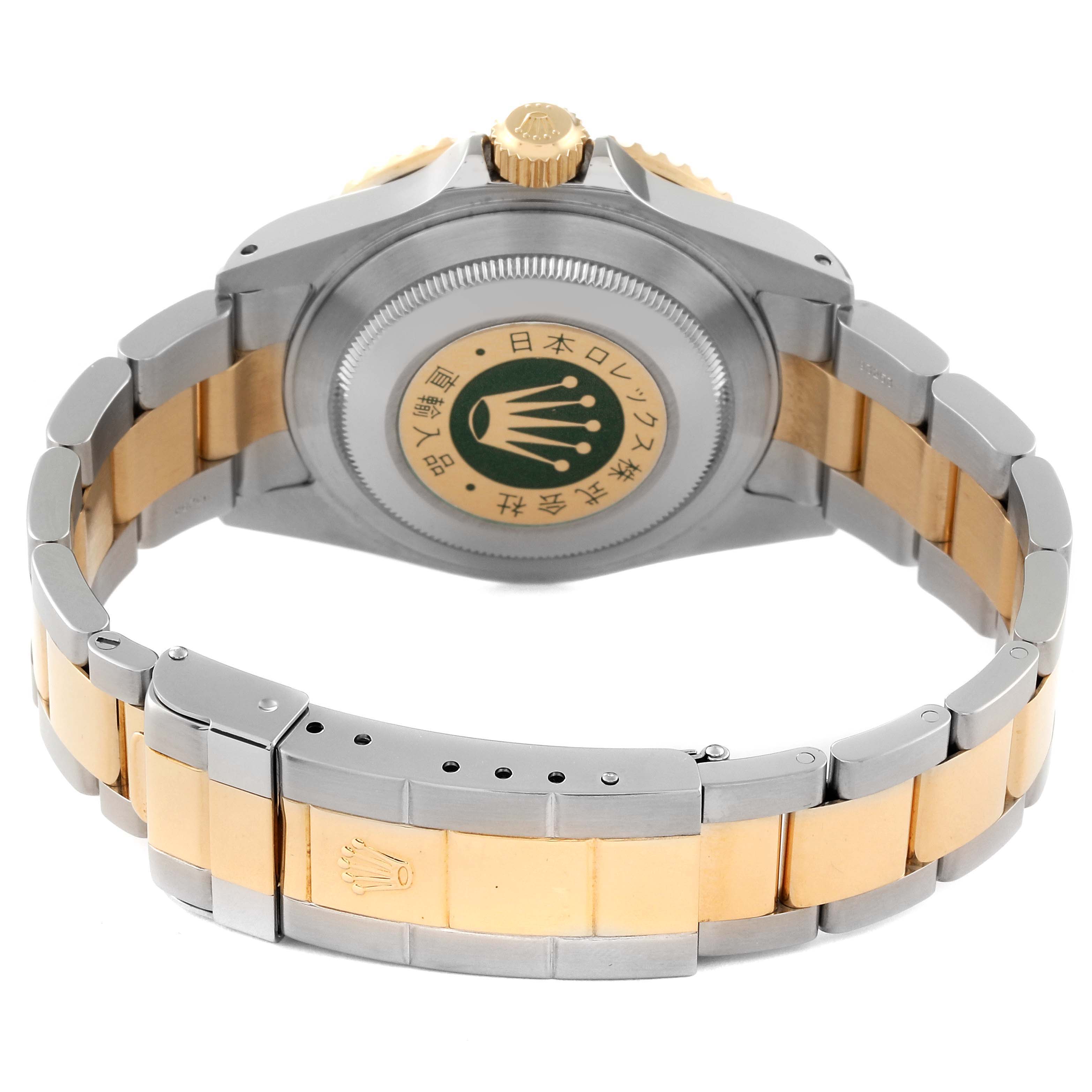 The image shows the back case and bracelet of a Rolex Submariner 16613 Men's Steel and Gold (two tone) Champagne Dial 16613 Men's Steel and Gold (two tone) Champagne Dial watch, viewed from a rear angle.