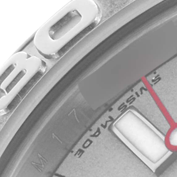 The image shows a close-up of a Rolex Yacht-Master 169622 Women
s Stainless Steel Silver Dial 169622 Women
s Stainless Steel Silver Dial watch dial, focusing on part of the bezel, indices, and the word "SWISS MADE."