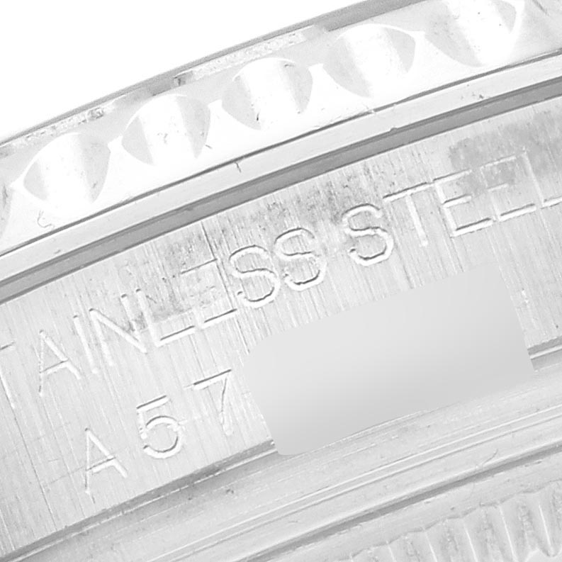 The image shows a close-up of the edge and engravings on the bezel of a Rolex Yacht-Master 168622 Men
s Stainless Steel Silver Dial 168622 Men
s Stainless Steel Silver Dial watch.