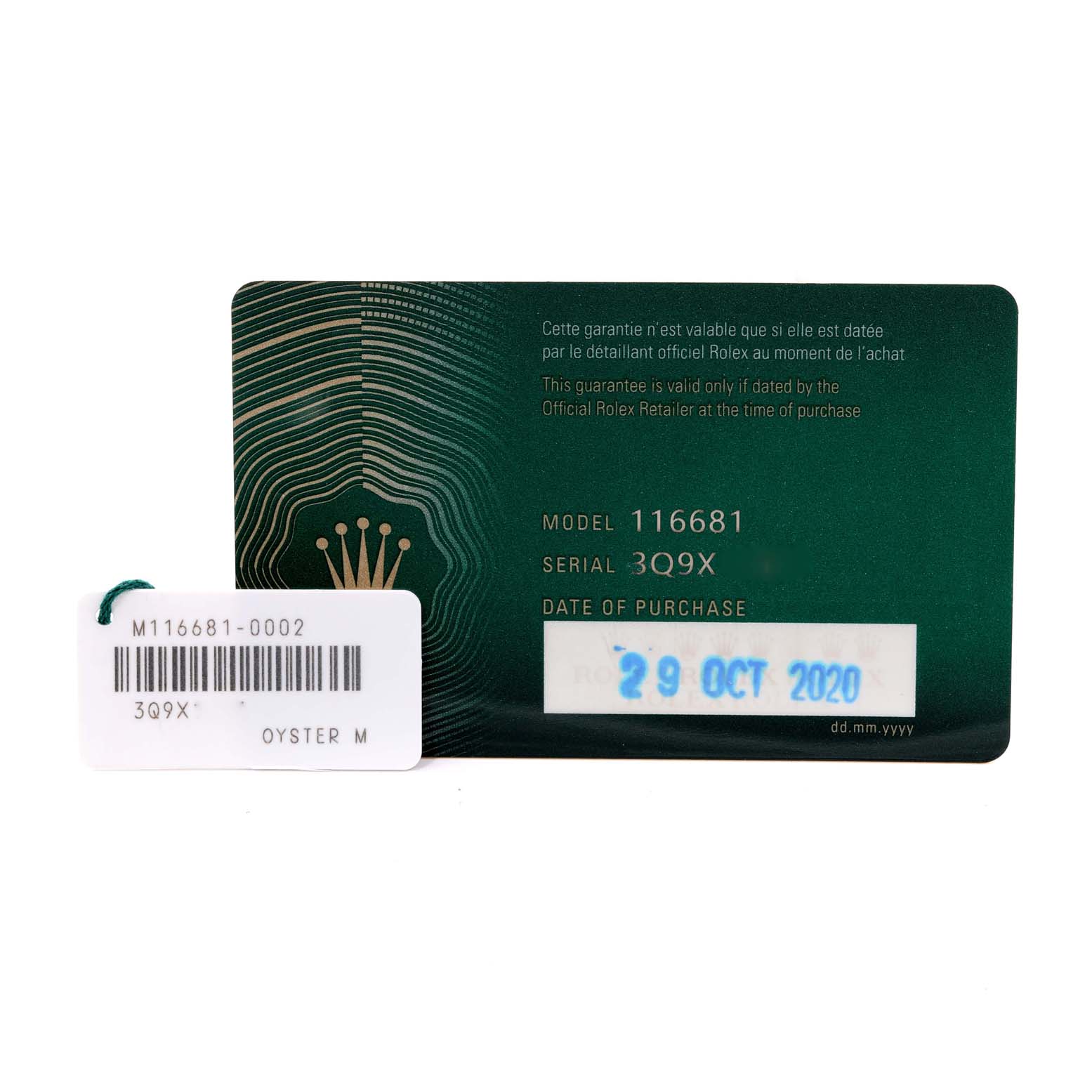 The image shows the warranty card and a tag for the Rolex Yacht-Master 116681 Men
s Steel and Gold (two tone) White Dial 116681 Men
s Steel and Gold (two tone) White Dial model 116681 watch.