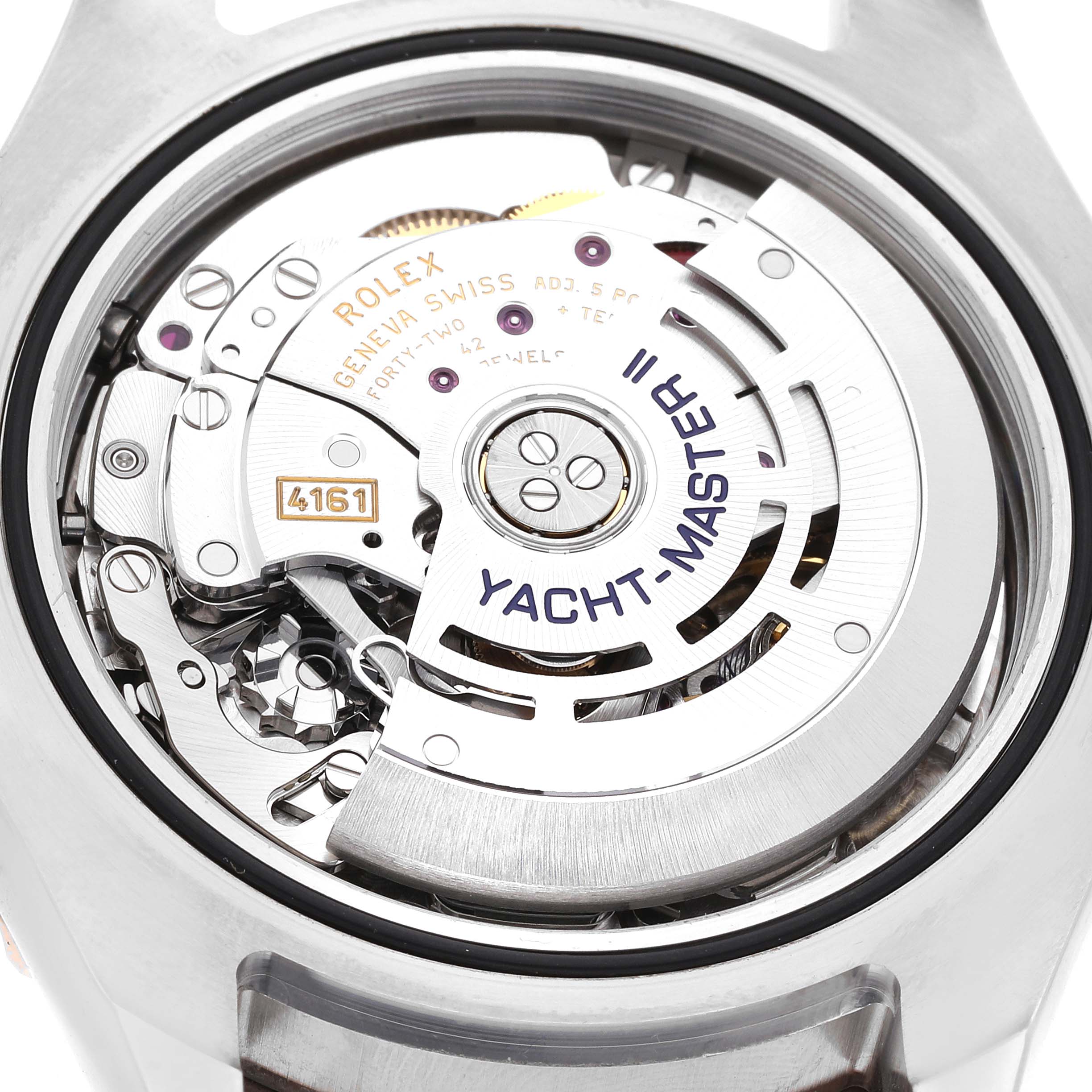The image shows the internal mechanism of a Rolex Yacht-Master 116681 Men
s Steel and Gold (two tone) White Dial 116681 Men
s Steel and Gold (two tone) White Dial watch, viewed from the rear case-back.