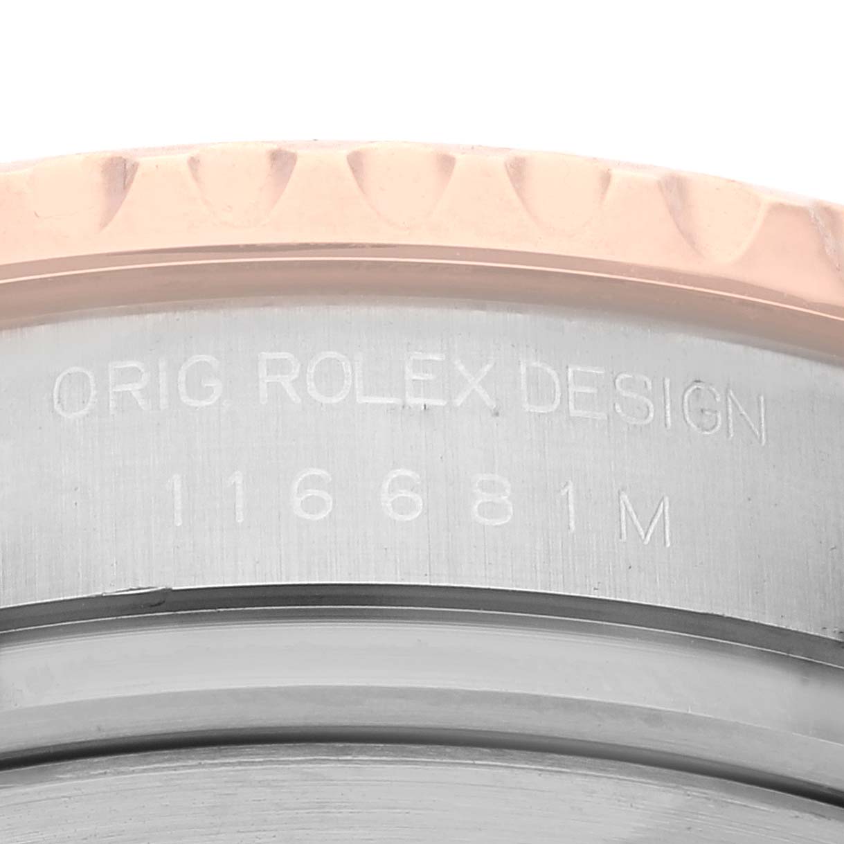 The image shows a close-up of the case side of a Rolex Yacht-Master 116681 Men
s Steel and Gold (two tone) White Dial 116681 Men
s Steel and Gold (two tone) White Dial watch, highlighting the engraved model number "116681M."