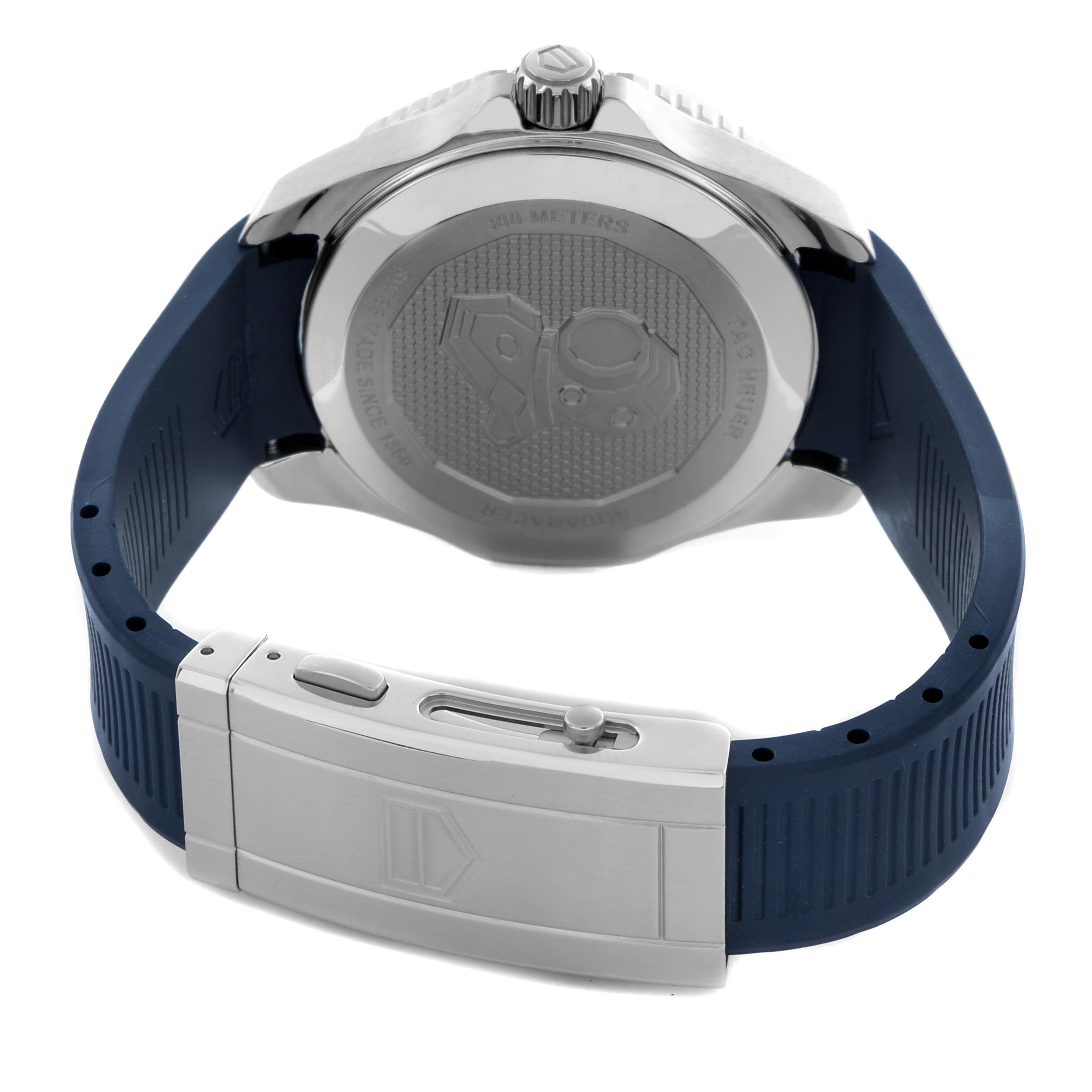The image shows the back view of a Tag Heuer Aquaracer WBP2010.FT6198 Men's Stainless Steel Blue Dial WBP2010.FT6198 Men's Stainless Steel Blue Dial, highlighting the case back and blue rubber strap with a clasp.