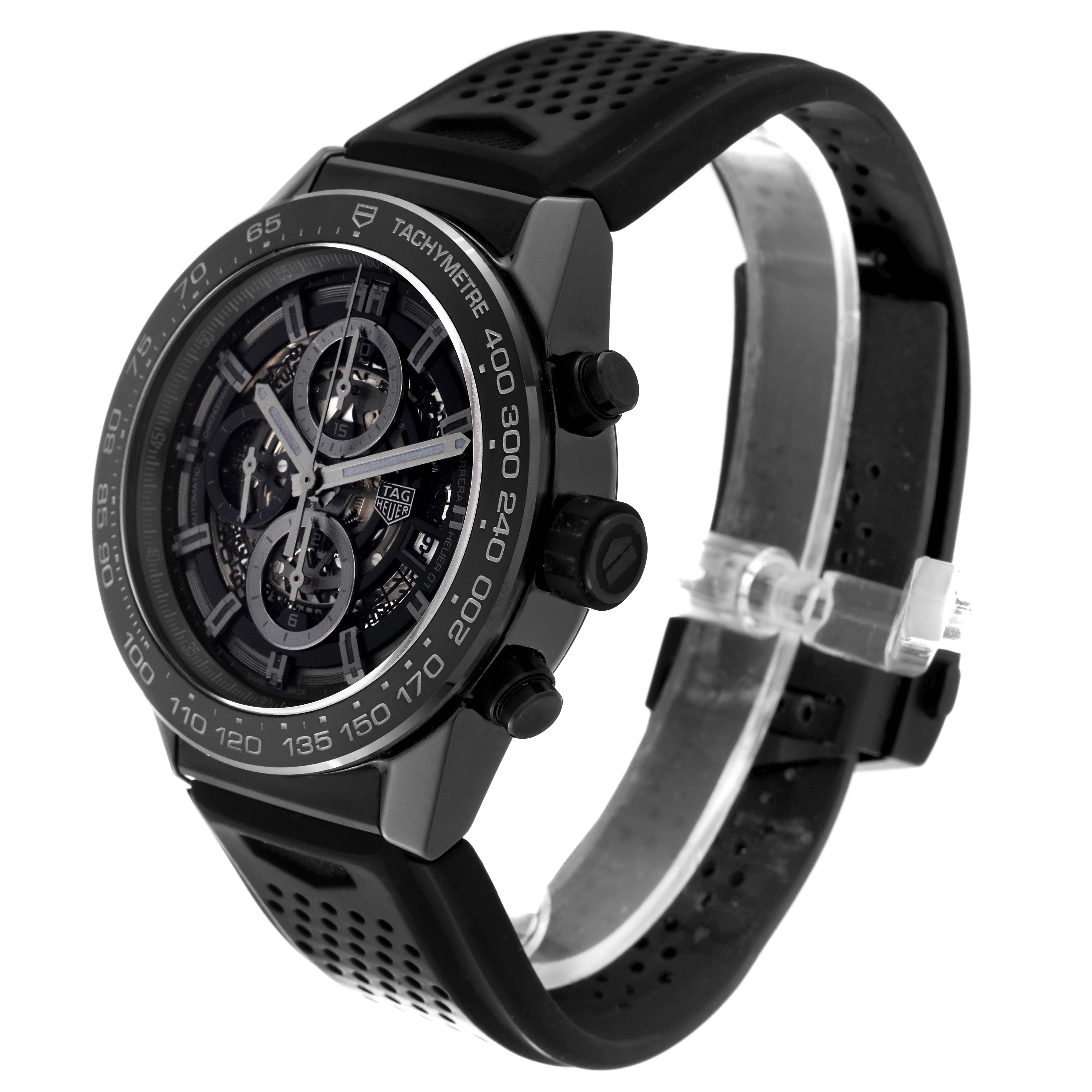 The image shows a Tag Heuer Carrera CAR2A90.FT6071 Men's Ceramic Black Dial CAR2A90.FT6071 Men's Ceramic Black Dial model watch at a 3/4 angle, highlighting the tachymeter bezel, chronograph sub-dials, and perforated strap.