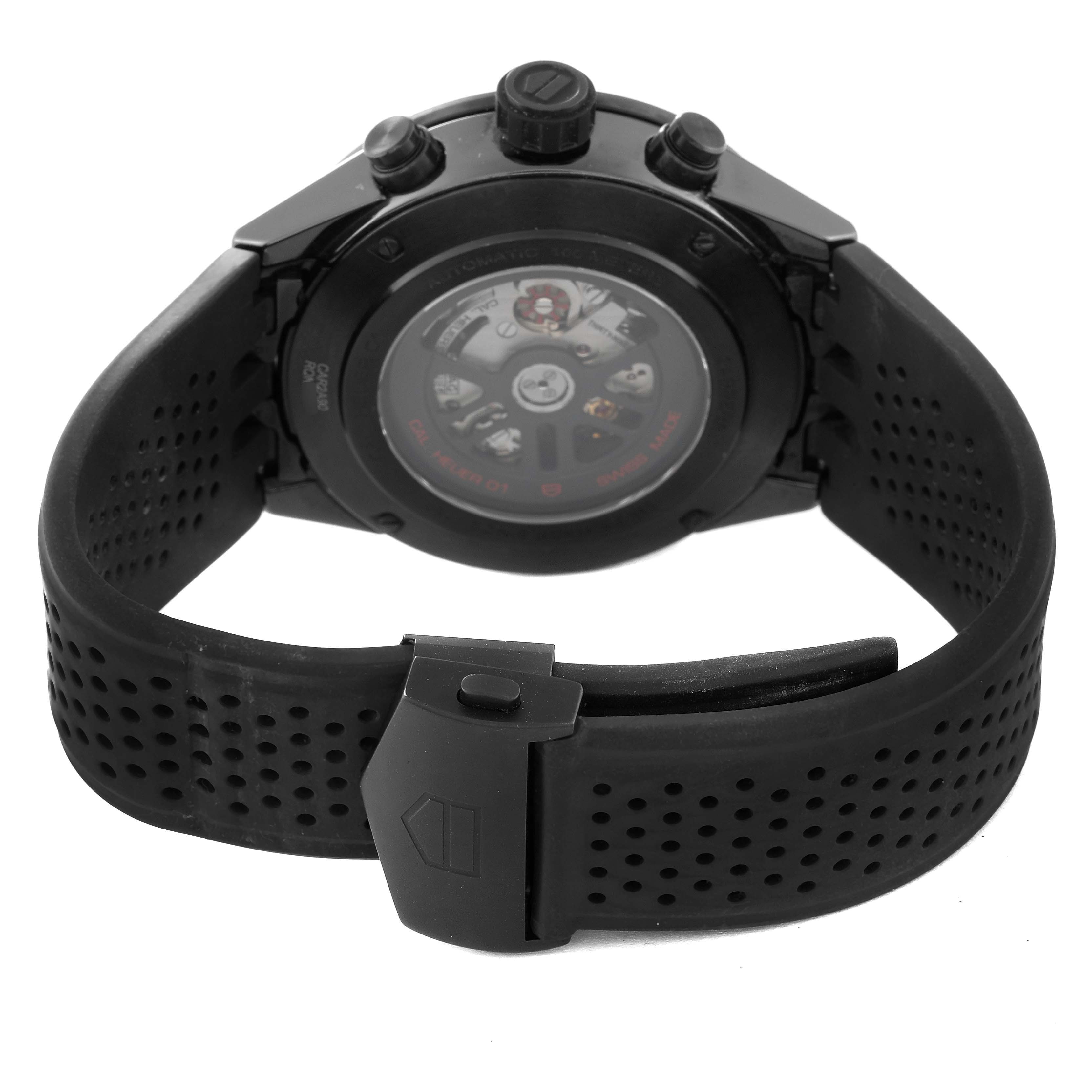 The image shows the back view of a Tag Heuer Carrera CAR2A90.FT6071 Men's Ceramic Black Dial CAR2A90.FT6071 Men's Ceramic Black Dial watch, highlighting its black rubber strap and transparent case back.