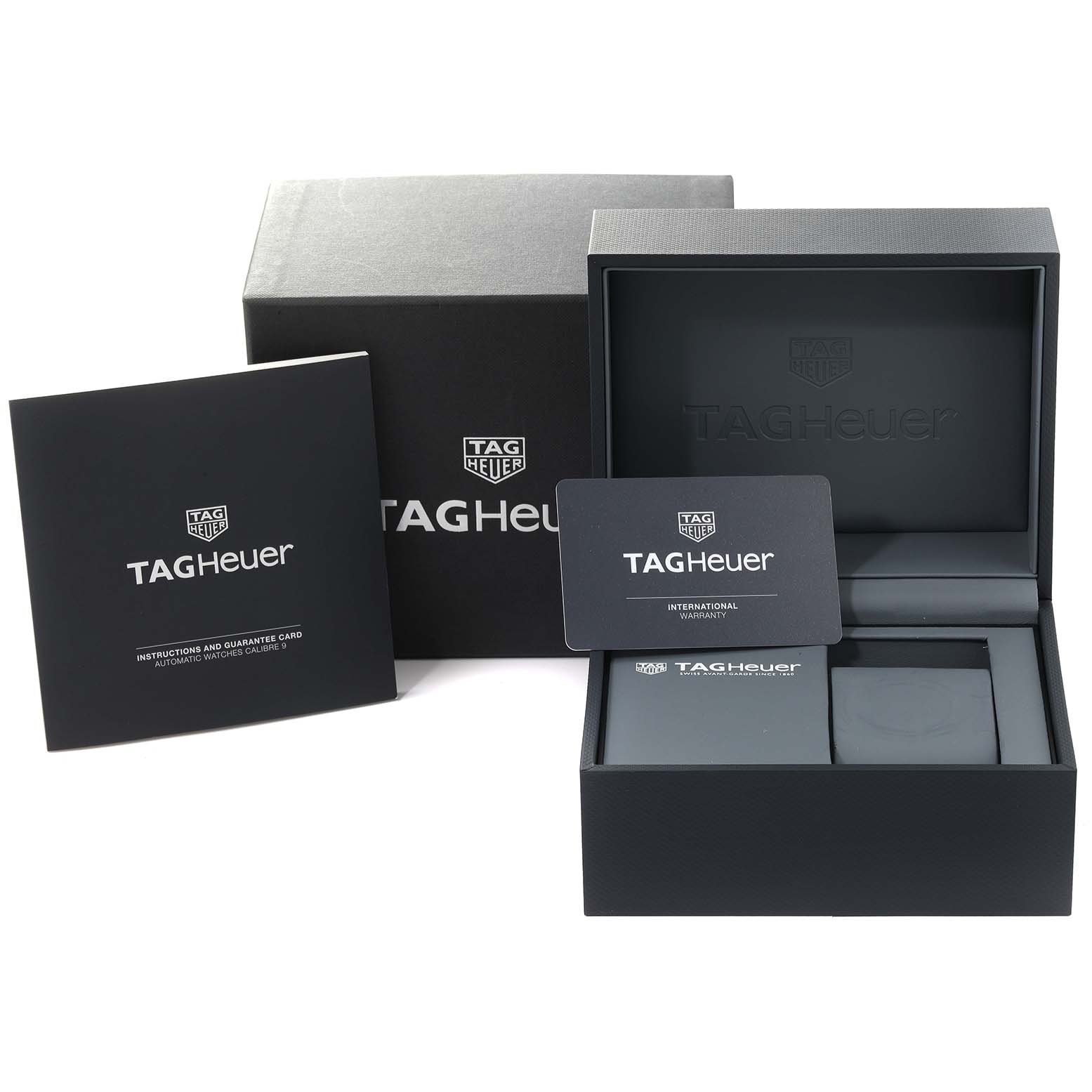 The image shows the packaging, international warranty card, and instruction manual for the Tag Heuer Carrera CAR2A90.FT6071 Men's Ceramic Black Dial CAR2A90.FT6071 Men's Ceramic Black Dial model watch.