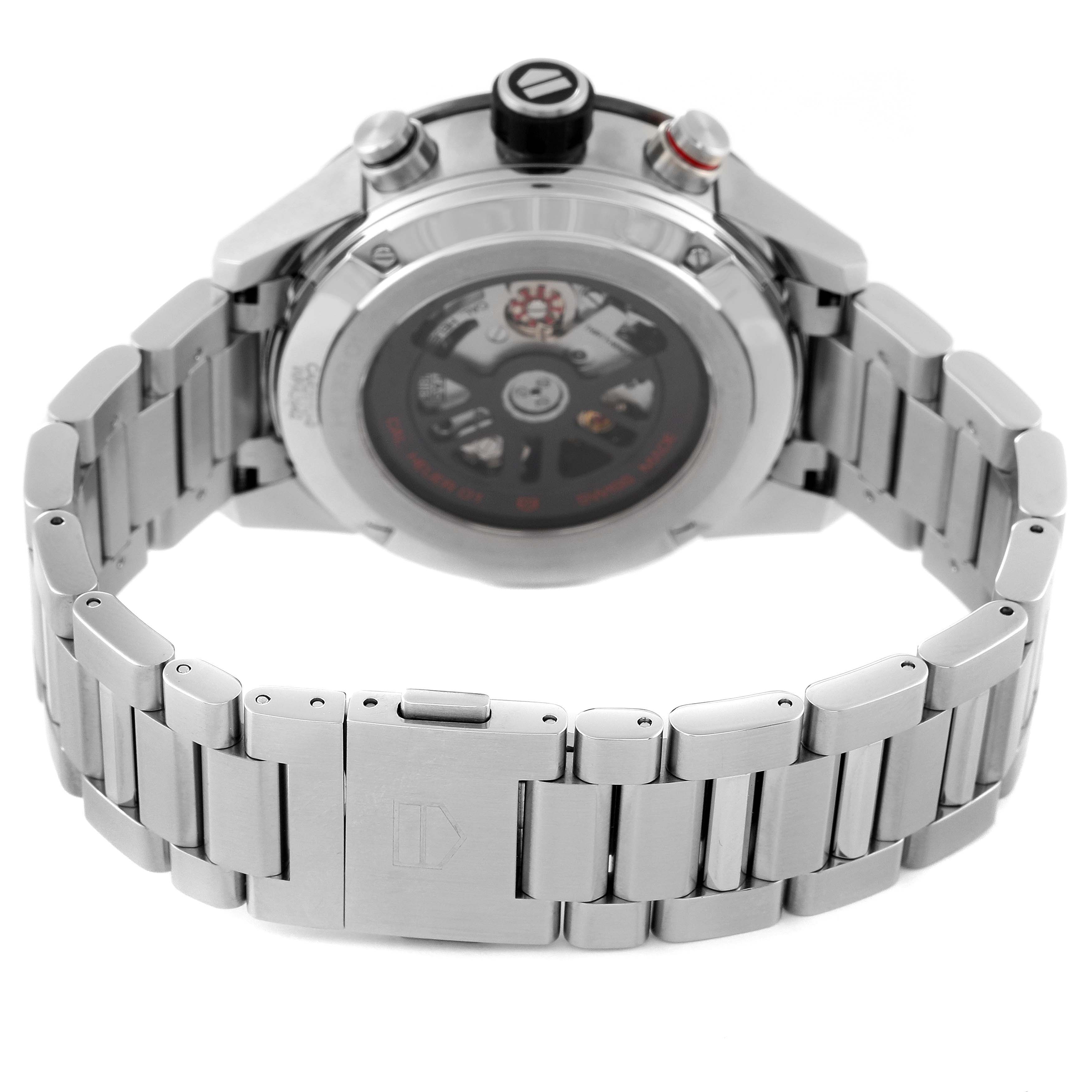 The image shows the back view of the Tag Heuer Carrera CAR201U.BA0766 Men
s Stainless Steel Brown Dial CAR201U.BA0766 Men
s Stainless Steel Brown Dial watch, highlighting the bracelet, clasp, and see-through case back.