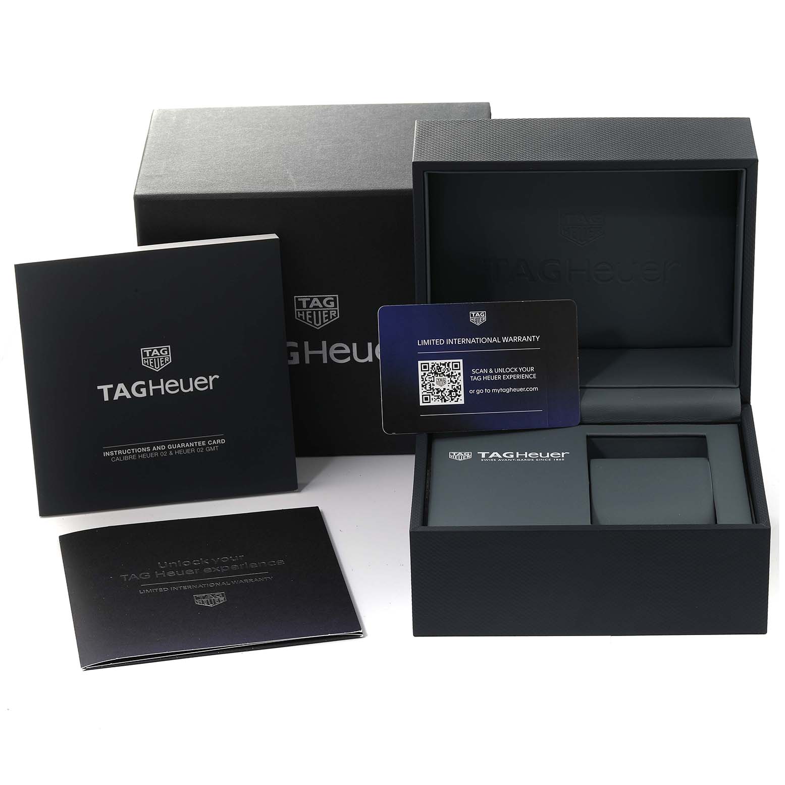 The image shows the box, manual, and warranty card for the Tag Heuer Carrera CBN2A1B.BA0643 Men's Stainless Steel Black Dial CBN2A1B.BA0643 Men's Stainless Steel Black Dial model watch.