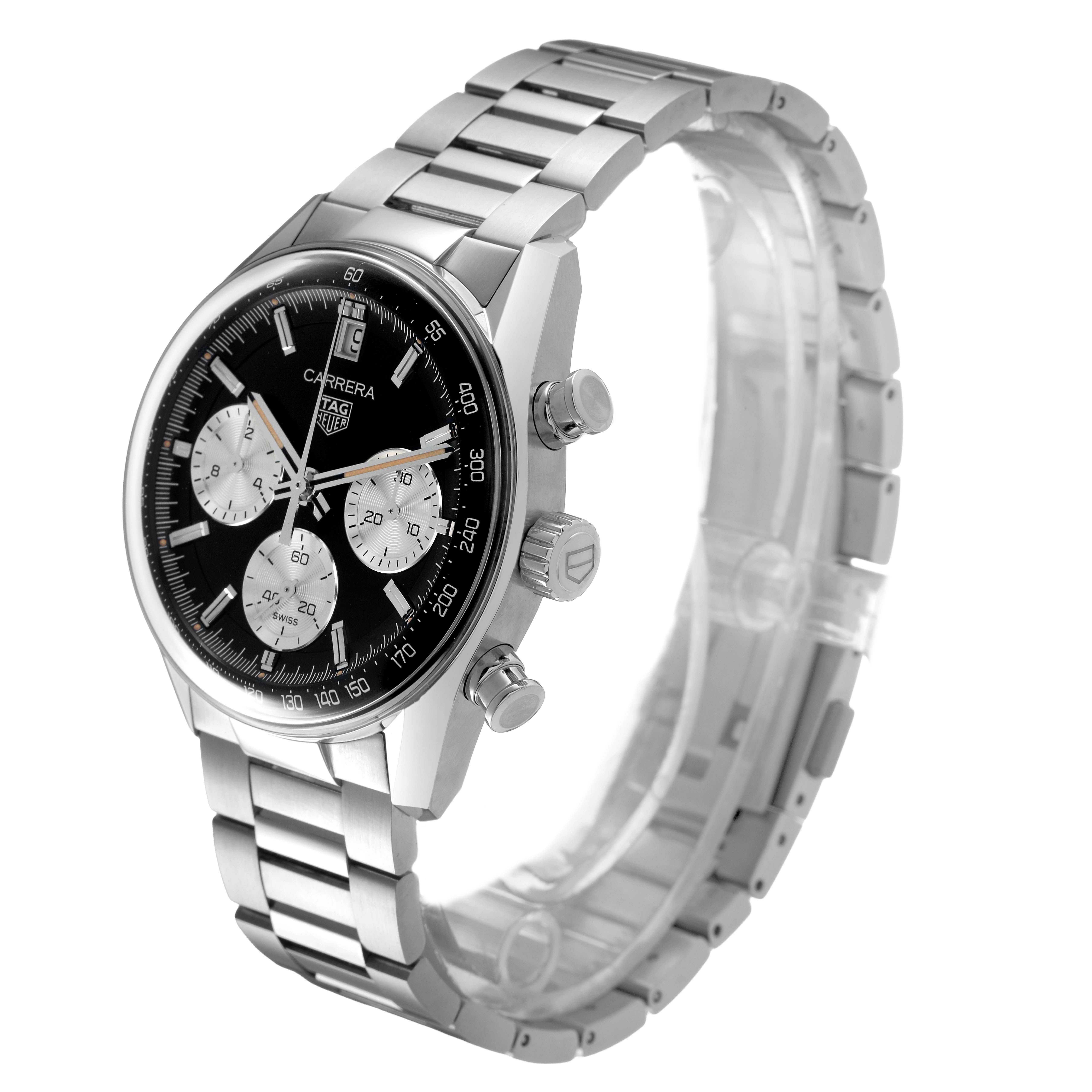 The Carrera model by Tag Heuer is shown at a three-quarter angle, highlighting the face, bezel, crown, pushers, and bracelet.