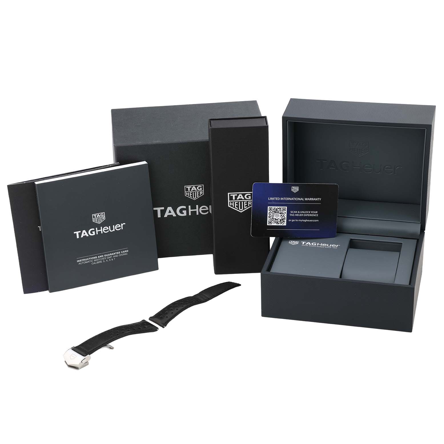 The image displays a Tag Heuer Carrera CBS2210.FC6534 Men's Stainless Steel Black Dial watch box set with manuals, a warranty card, and an additional strap.