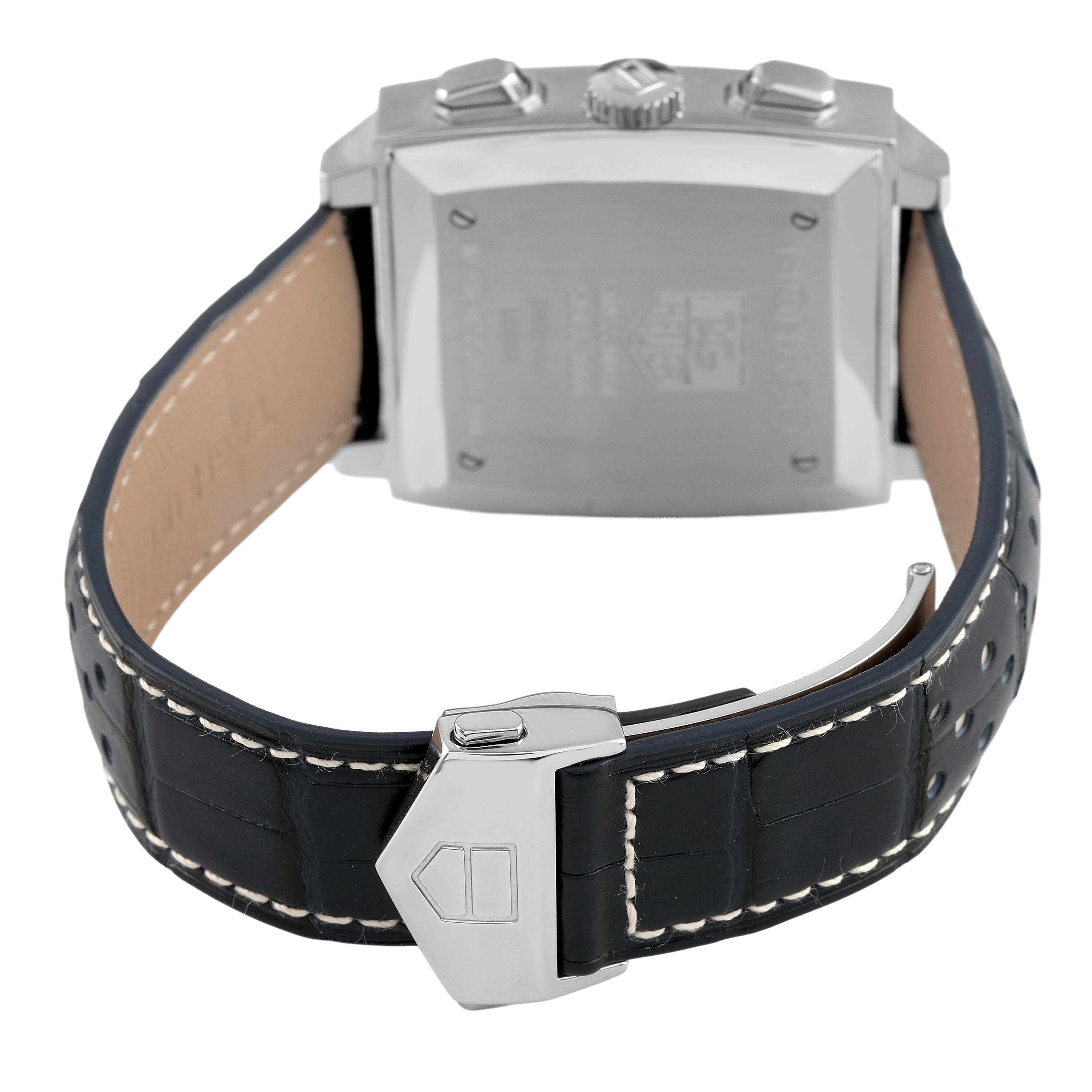 The image shows the back case and leather strap of the Tag Heuer Monaco CW2113 Men's Stainless Steel Blue Dial watch, highlighting the clasp and stitching.