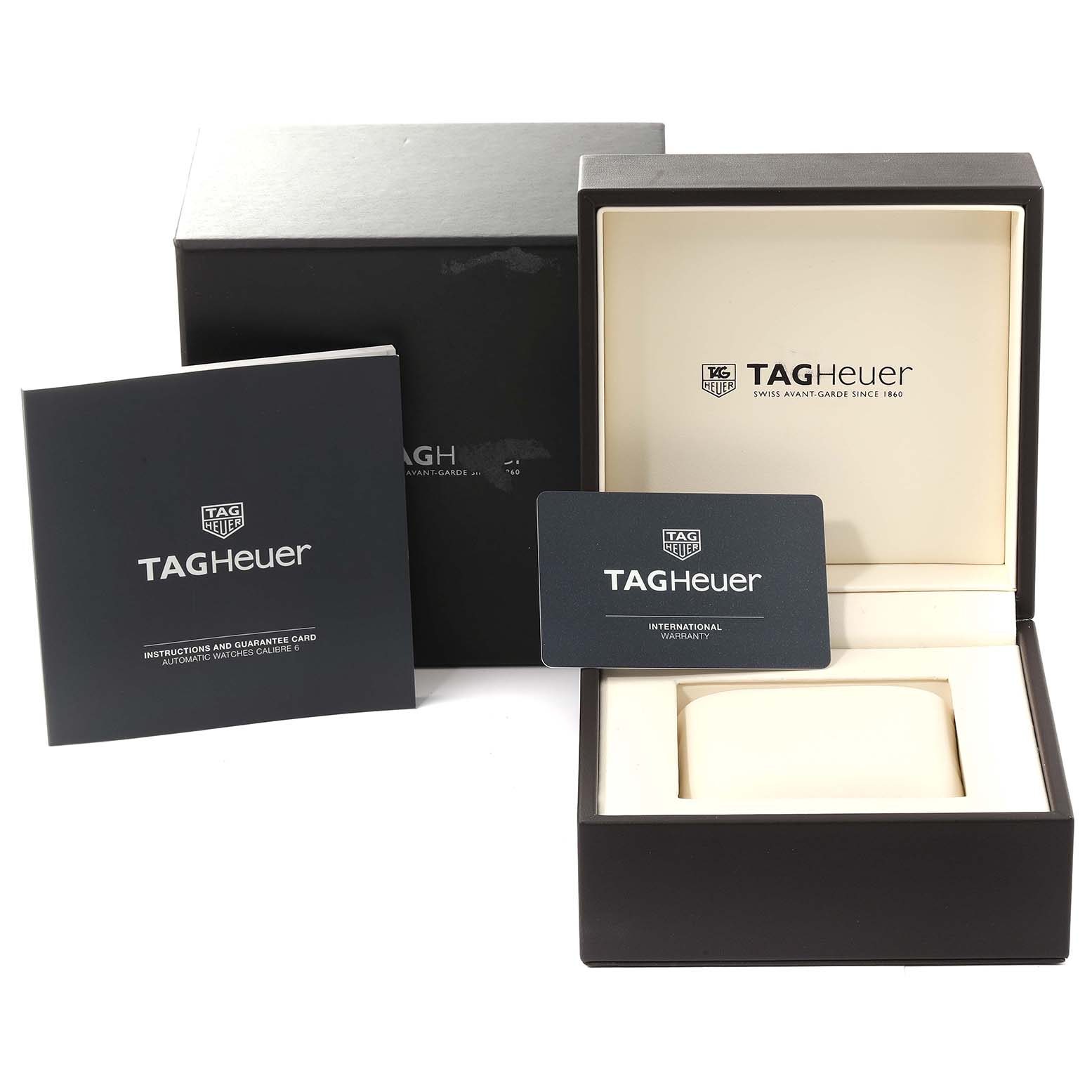 The image shows the packaging, instruction booklet, and warranty card for the Tag Heuer Monaco CAW211R.FC6401 Men's Stainless Steel Blue Dial CAW211R.FC6401 Men's Stainless Steel Blue Dial model.