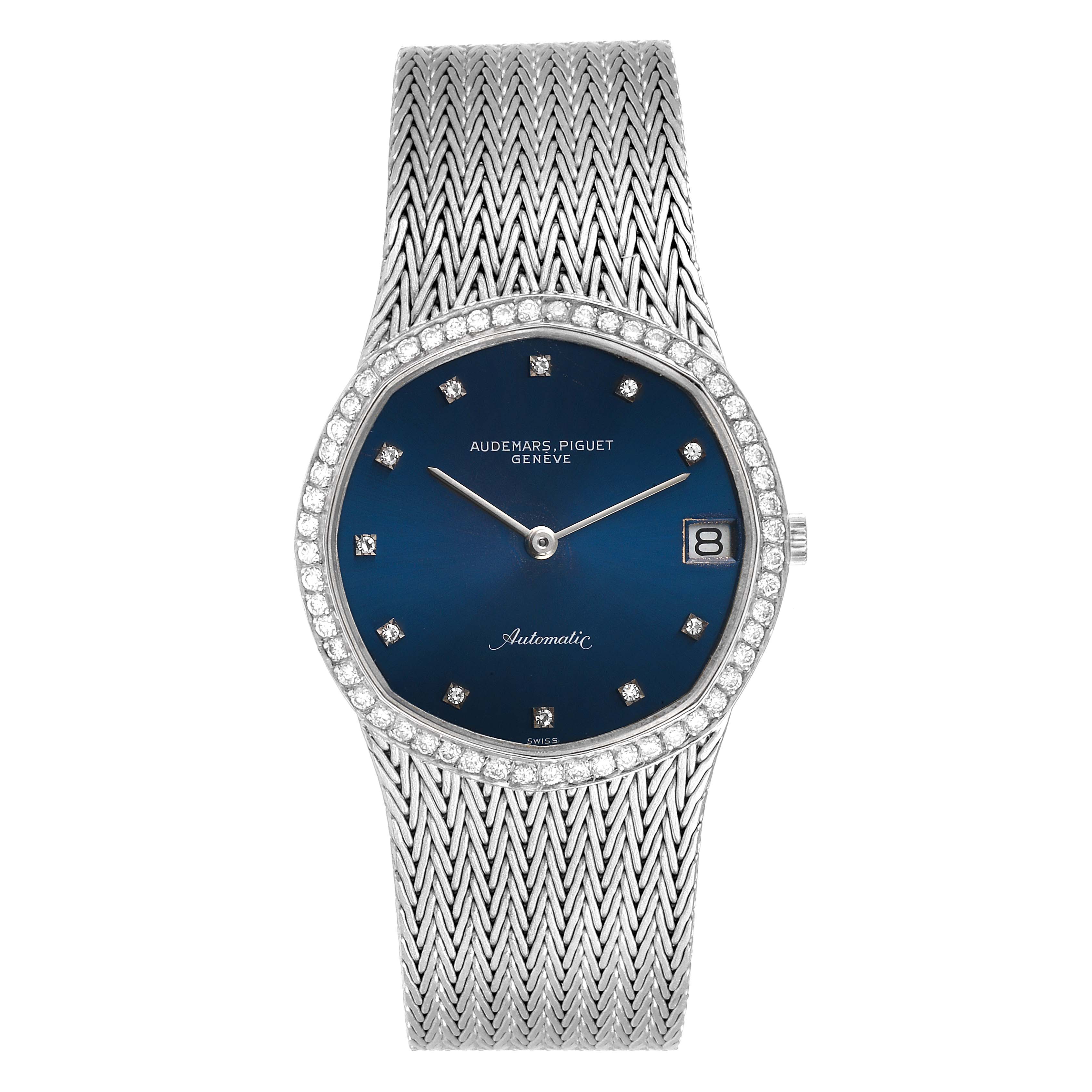 The image shows a direct front view of a Vintage Audemars Piguet watch with a blue dial, diamond markers, date window, and mesh bracelet.