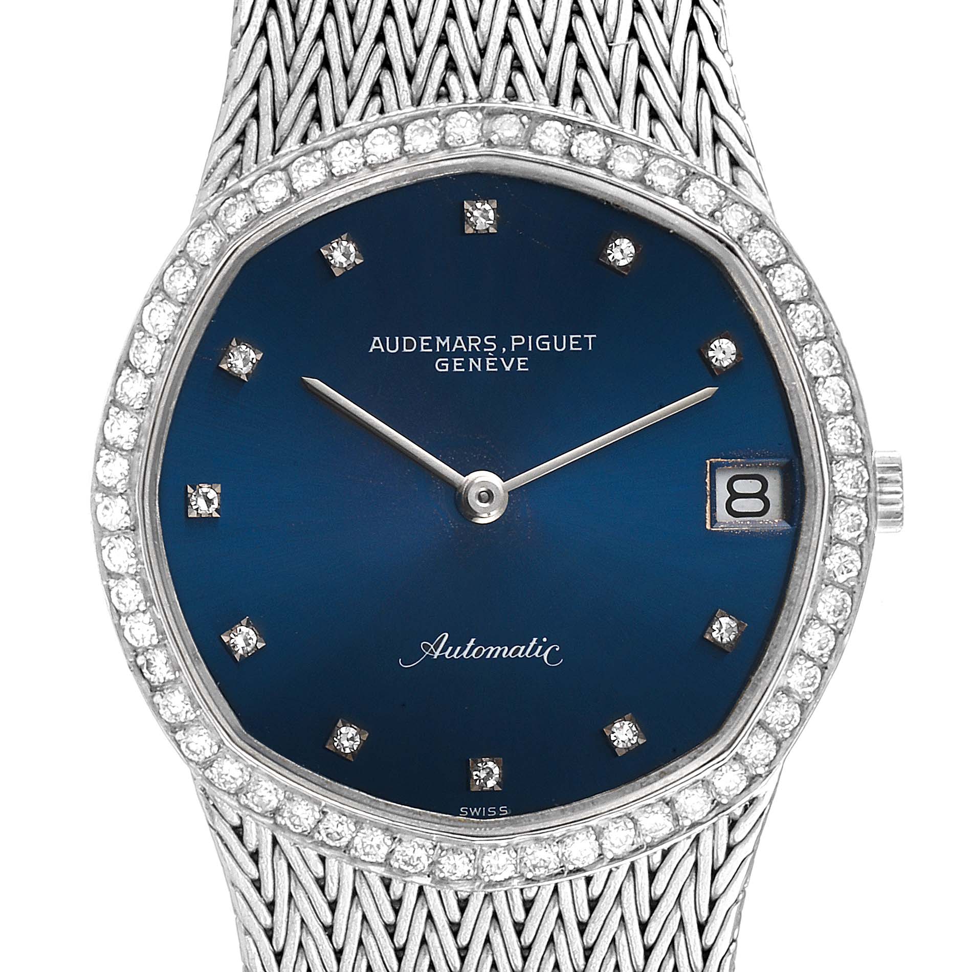 This image shows a close-up of the dial and bezel of a Vintage Audemars Piguet watch, displaying the face and part of the band.