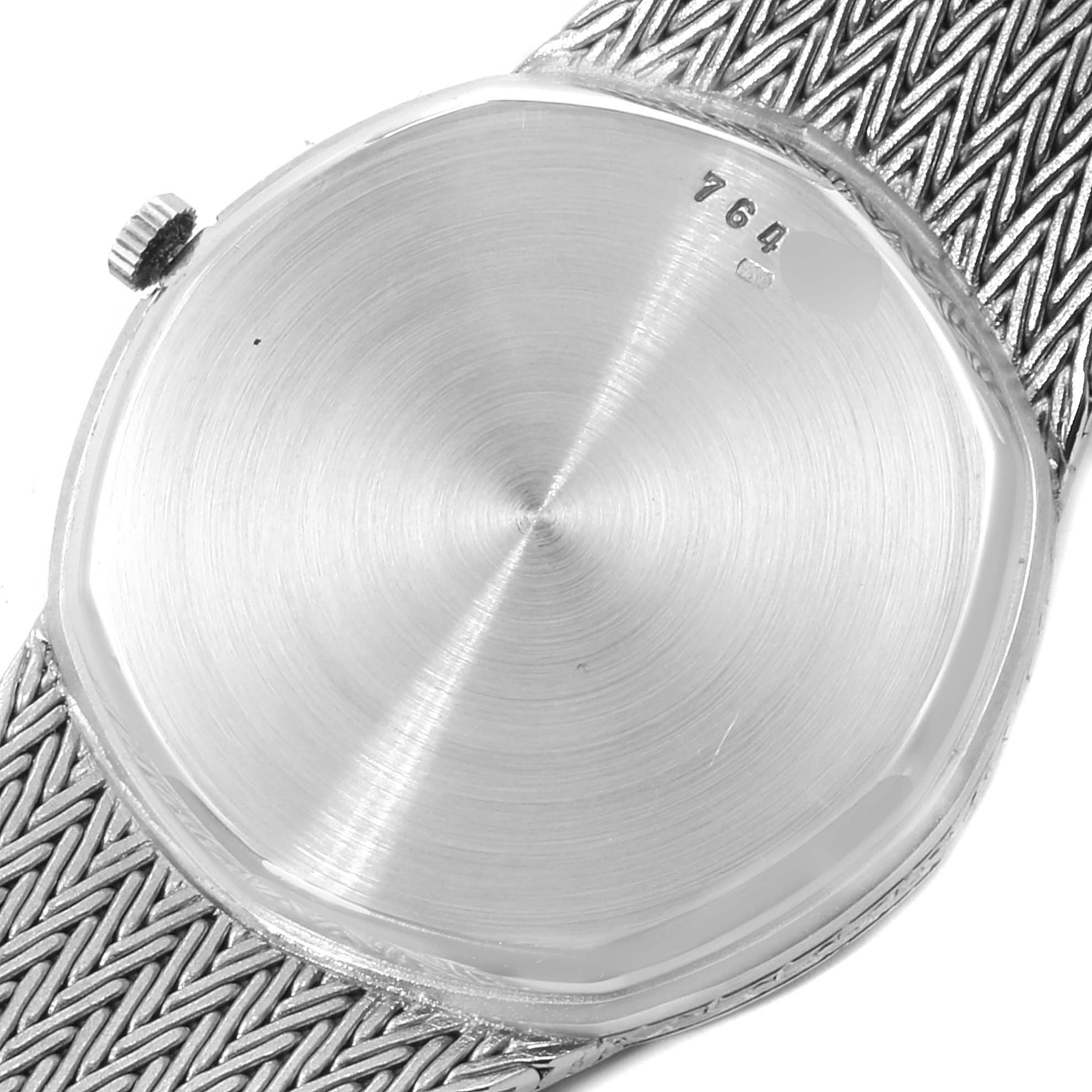 This image shows the back casing and part of the bracelet of a Vintage Audemars Piguet watch.