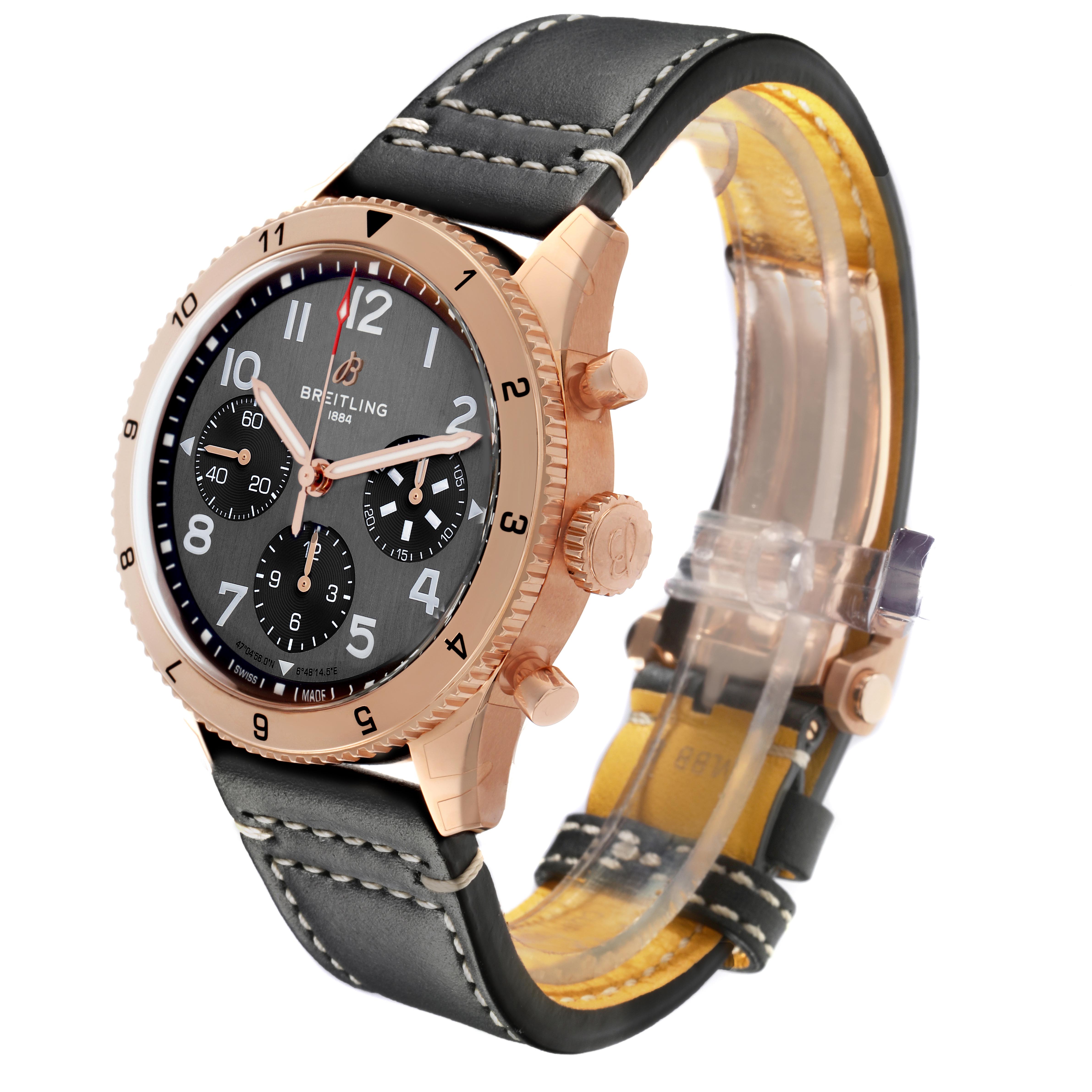 The Breitling Aviator R23380 Men's Rose Gold Grey Dial R23380 Men's Rose Gold Grey Dial watch is shown at a three-quarter angle, highlighting the rose gold case, dial, crown, buttons, and leather strap.