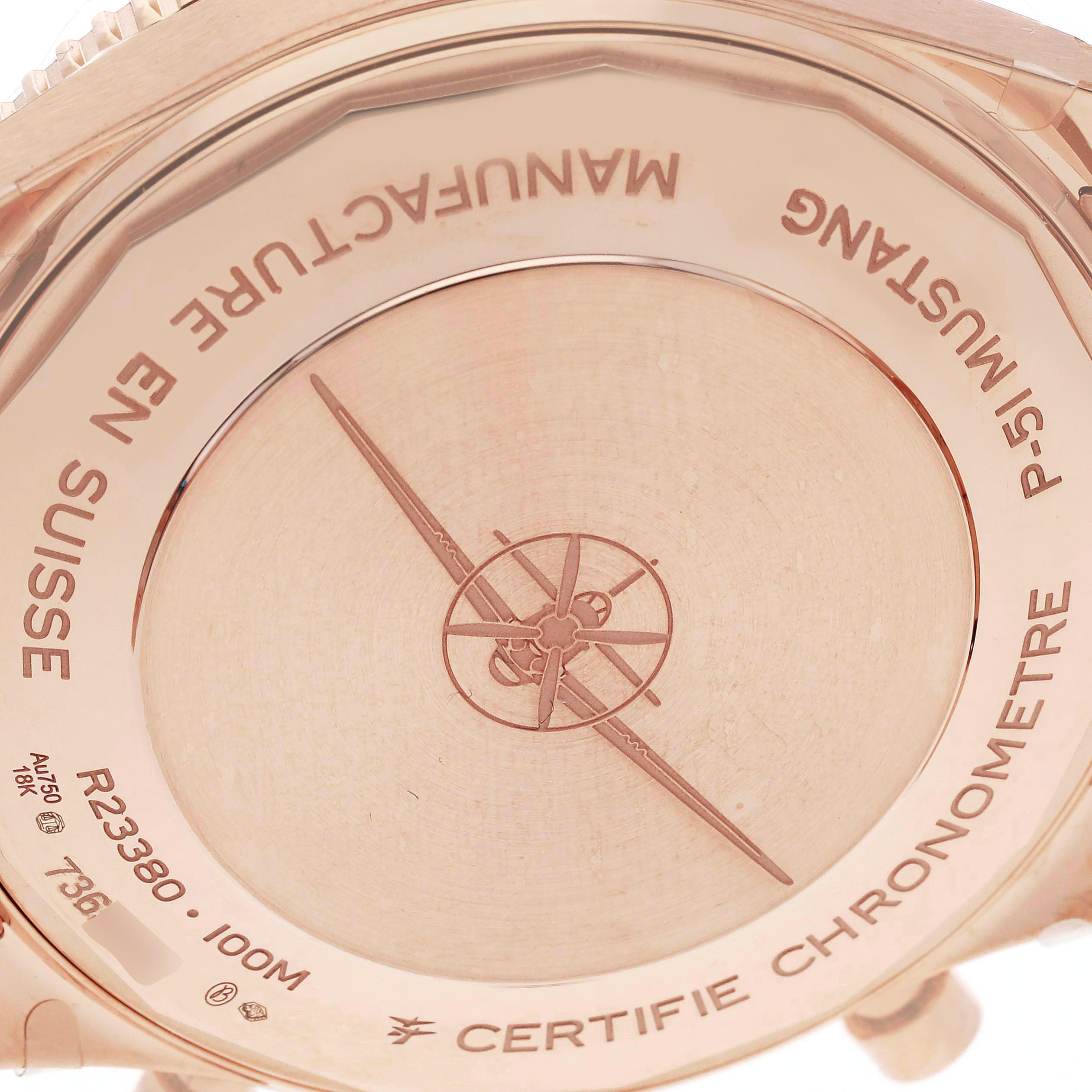 The image shows the case back of a Breitling Aviator R23380 Men's Rose Gold Grey Dial R23380 Men's Rose Gold Grey Dial watch, featuring engraved details and logo.