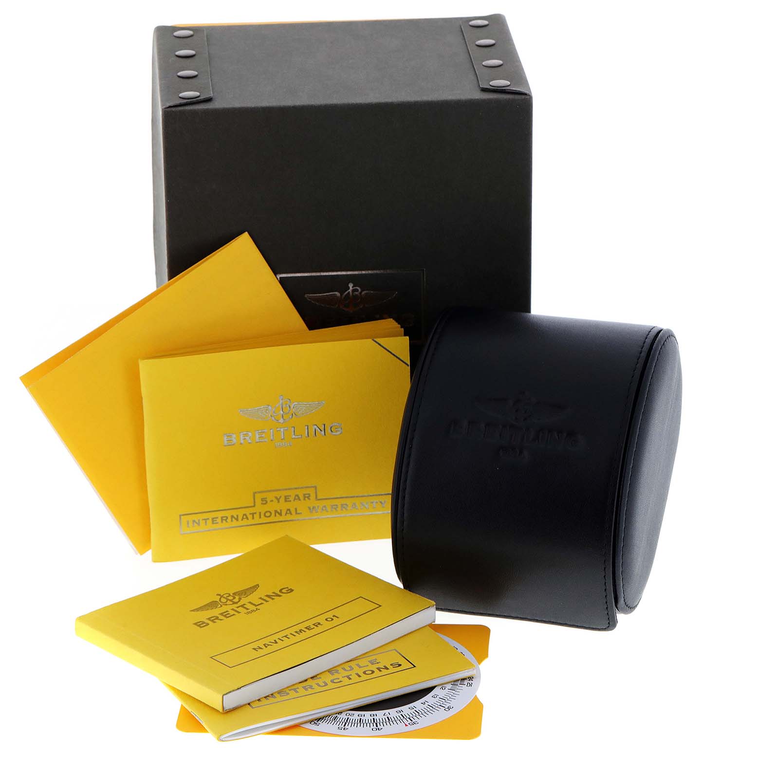 The image shows Breitling Navitimer AB0120 Men
s Stainless Steel Black Dial AB0120 Men
s Stainless Steel Black Dial watch accessories, including a box, case, manuals, and warranty papers.