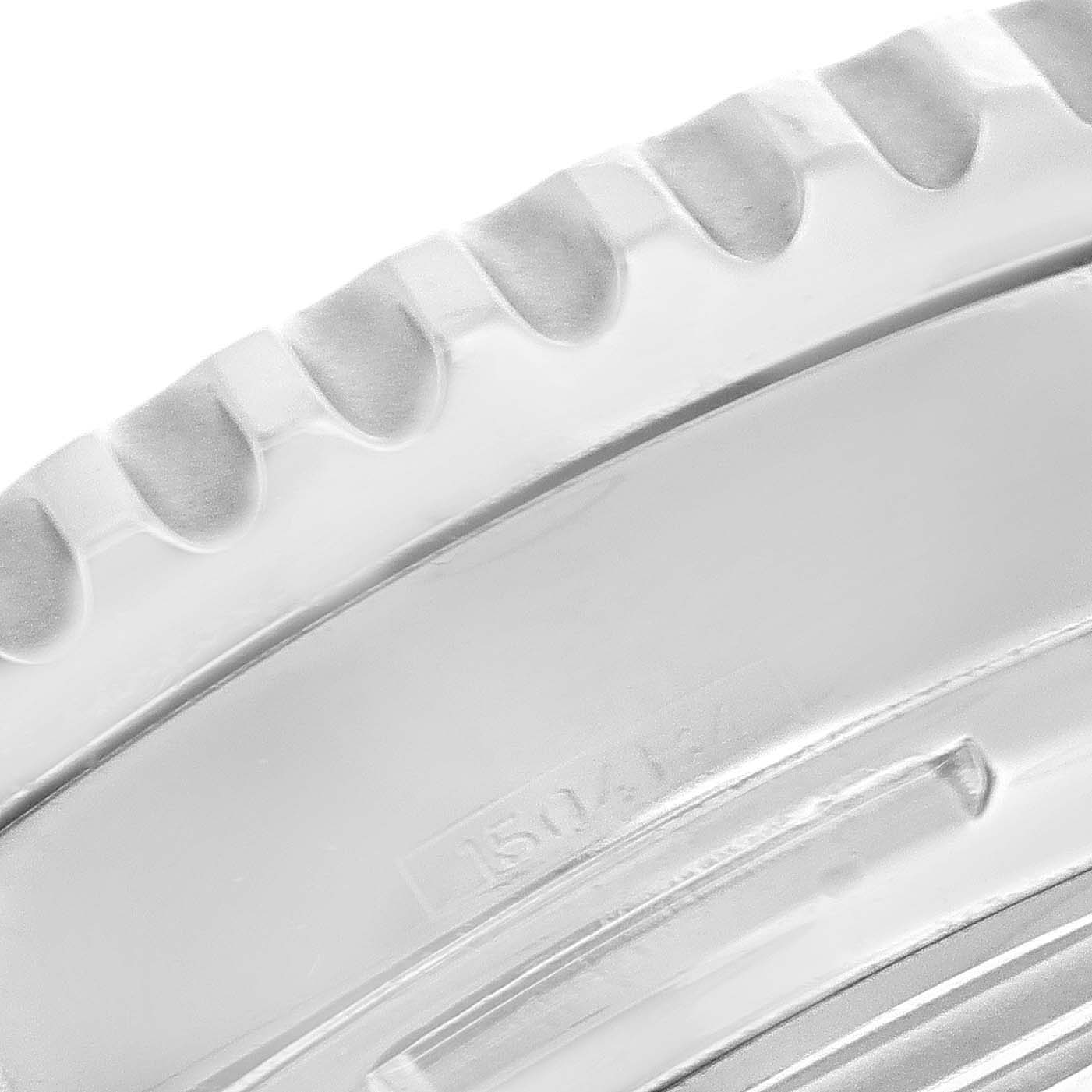 This close-up image shows the bezel
s edge detailing and part number of a Breitling Navitimer A23322 Men
s Stainless Steel Silver Dial A23322 Men
s Stainless Steel Silver Dial watch.