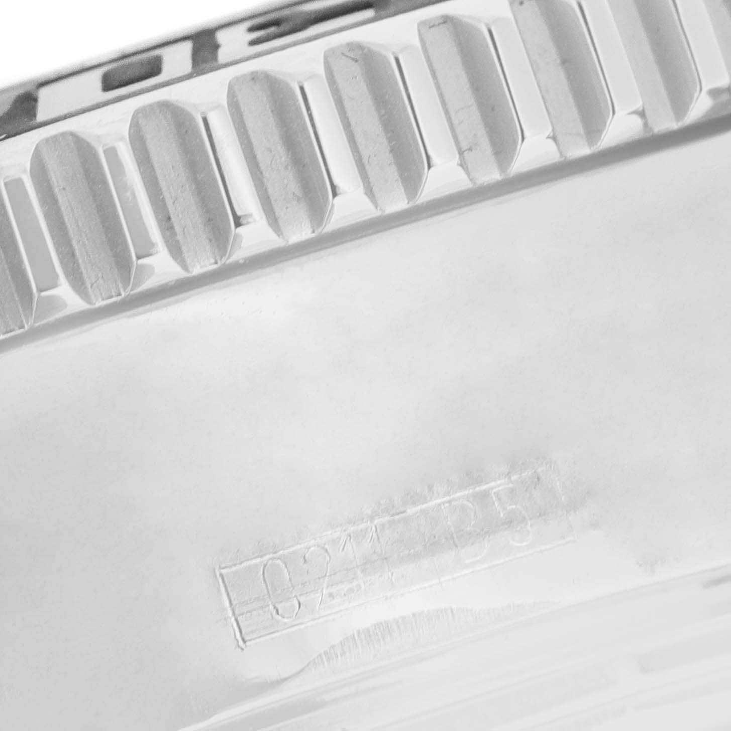 This image shows a close-up of the bezel and engraved serial number of a Breitling Superocean A17364 Men
s Stainless Steel Black Dial A17364 Men
s Stainless Steel Black Dial watch.