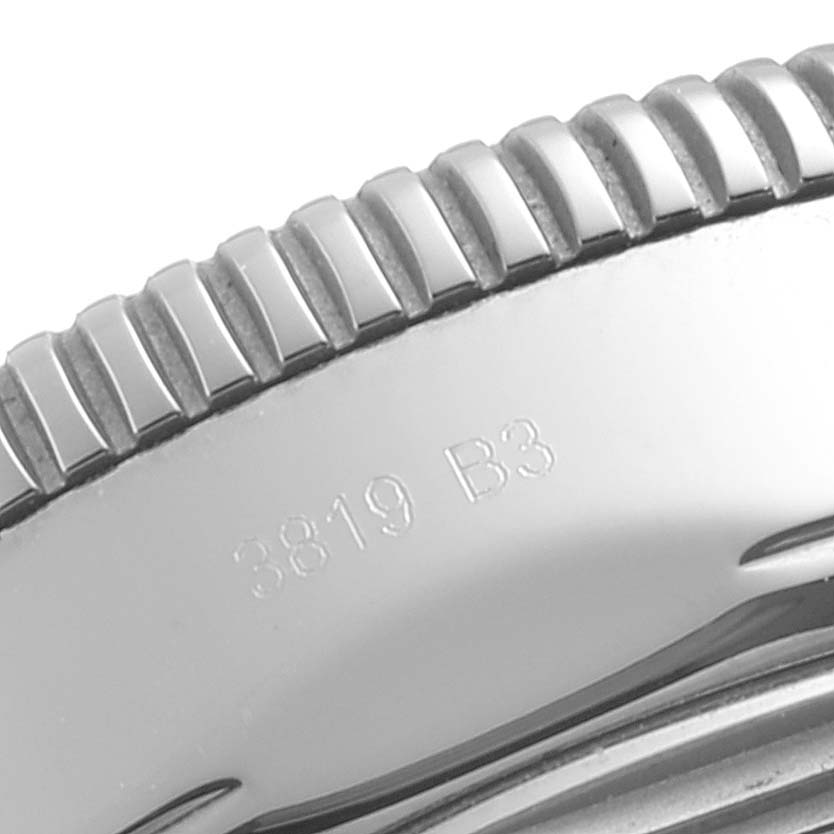 This image shows a close-up of the bezel edge and case side of a Breitling Superocean A17321 Men
s Stainless Steel Blue Dial A17321 Men
s Stainless Steel Blue Dial watch with the model number engraving.