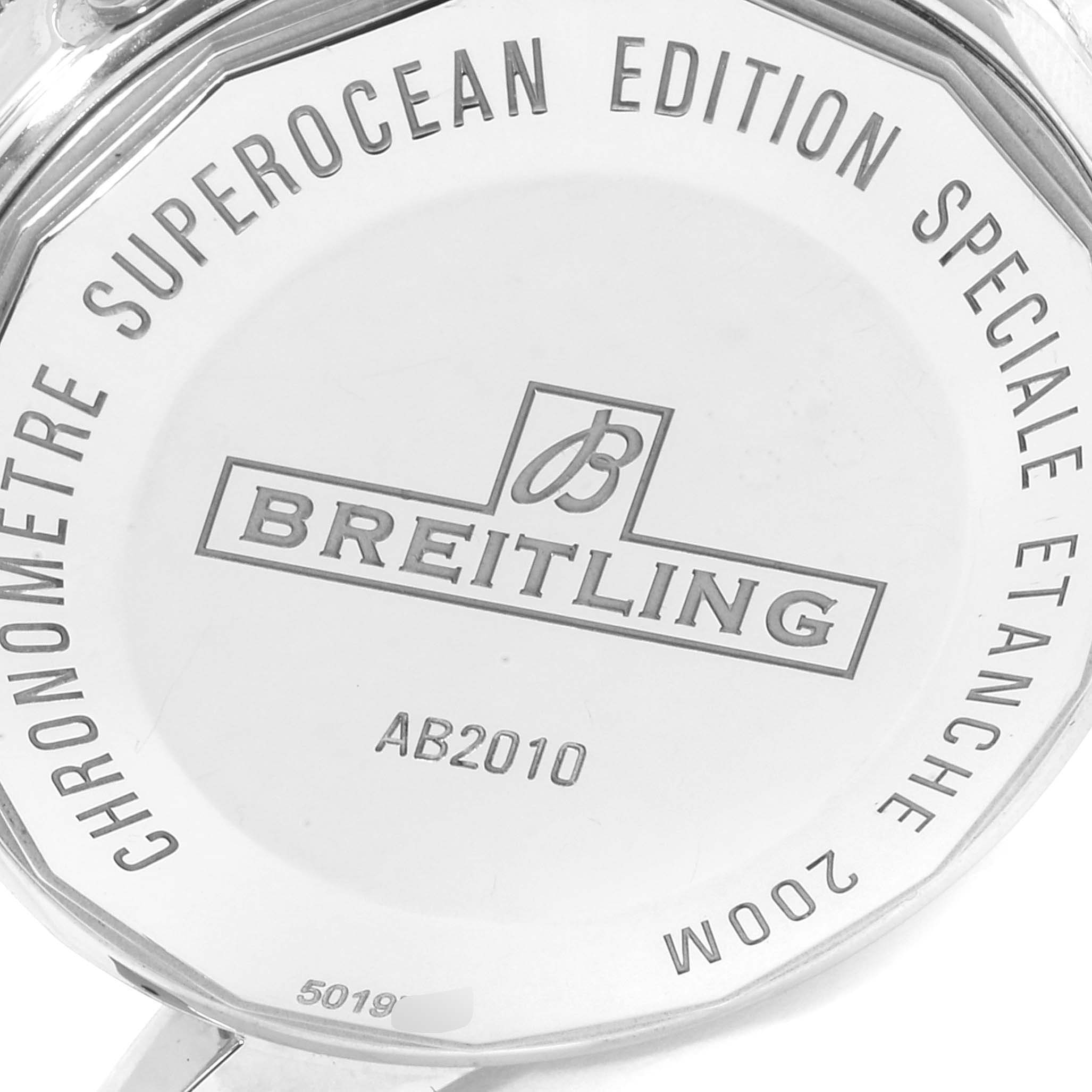 The image shows the back case of a Breitling Superocean A17321 Men
s Stainless Steel Blue Dial A17321 Men
s Stainless Steel Blue Dial model watch, highlighting the engravings and details.