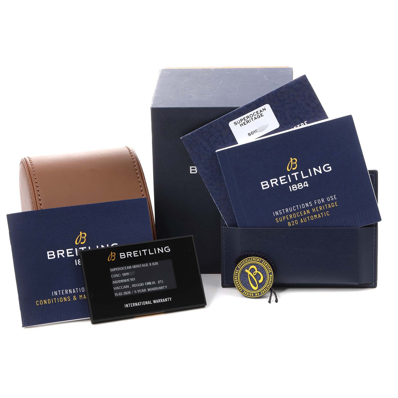 The image shows the packaging, warranty card, instruction manuals, and a leather case for the Breitling Superocean A17321 Men
s Stainless Steel Blue Dial A17321 Men
s Stainless Steel Blue Dial model.