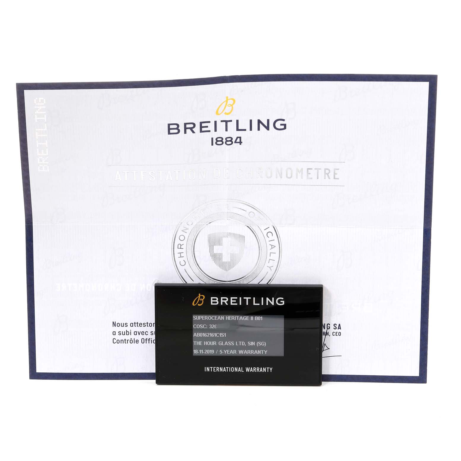 The image shows the warranty card and documentation for the Breitling Superocean AB016216/CA07/154A Men
s Stainless Steel Blue Dial AB016216/CA07/154A Men
s Stainless Steel Blue Dial model.