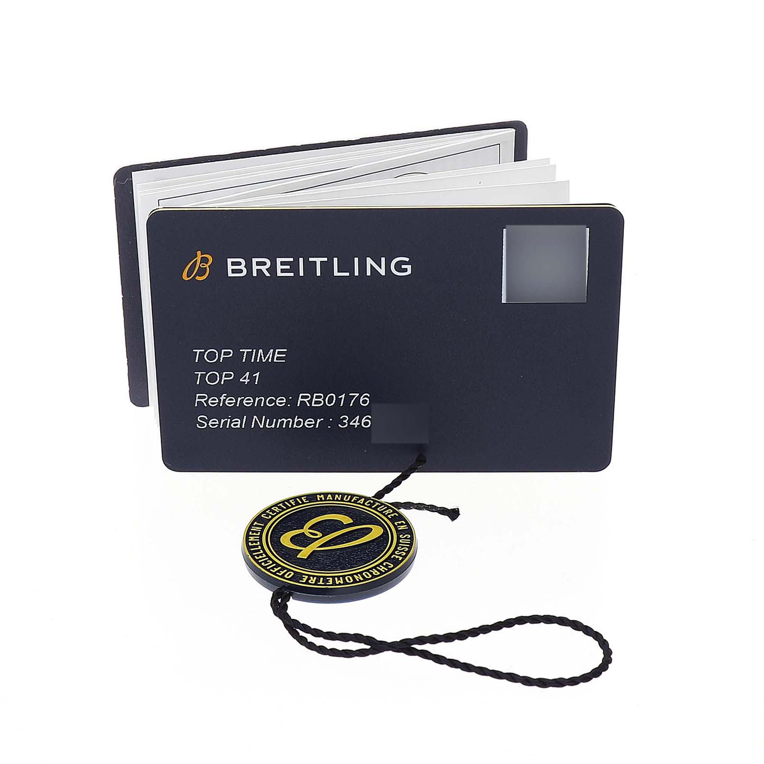 The image shows the Breitling Premier RB01761A1Q1X1 Men's Rose Gold Brown Dial model's warranty card and a tag, with brand information and serial details.
