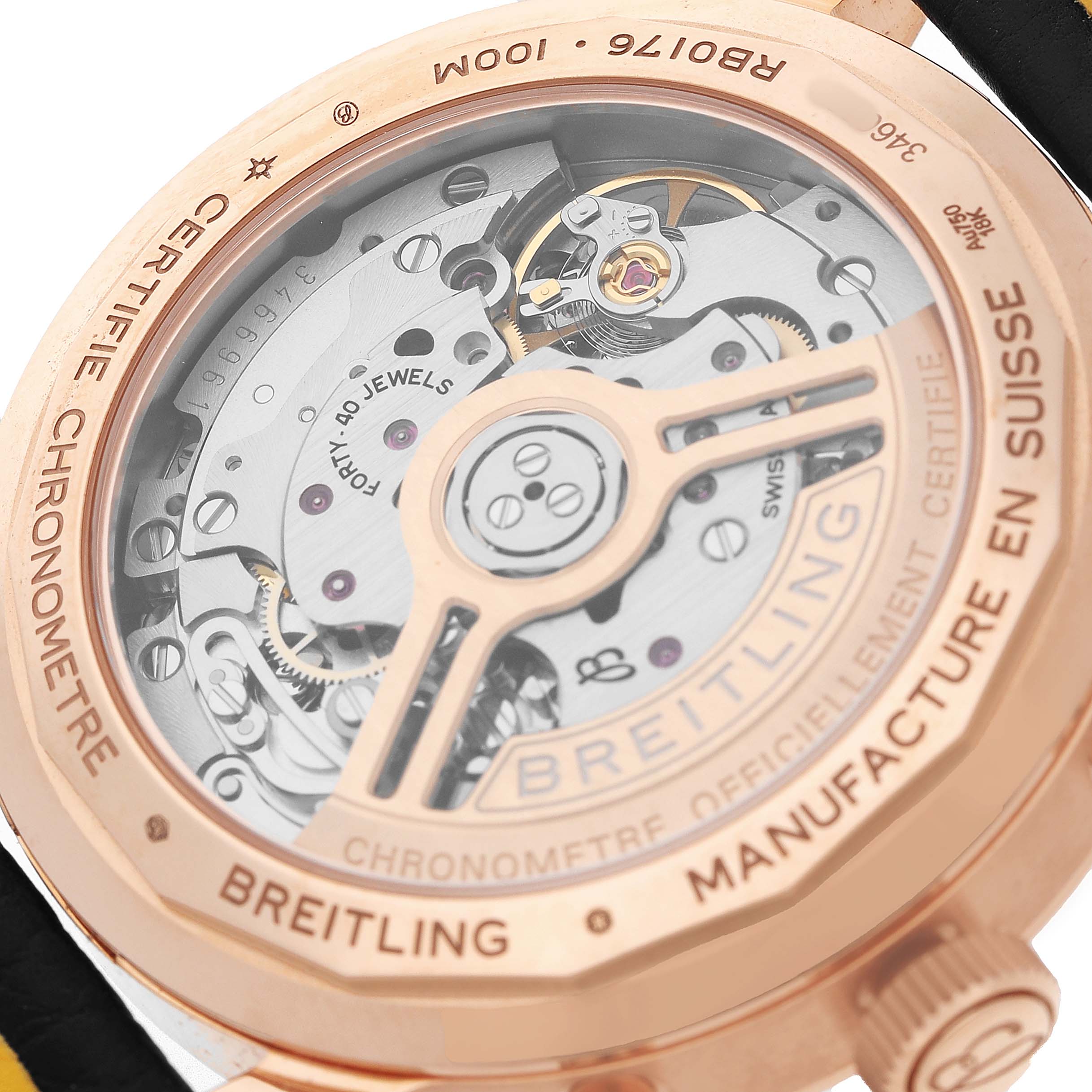 The image shows the rear view of the Breitling Premier RB01761A1Q1X1 Men's Rose Gold Brown Dial watch, highlighting its mechanical movement and intricate details.