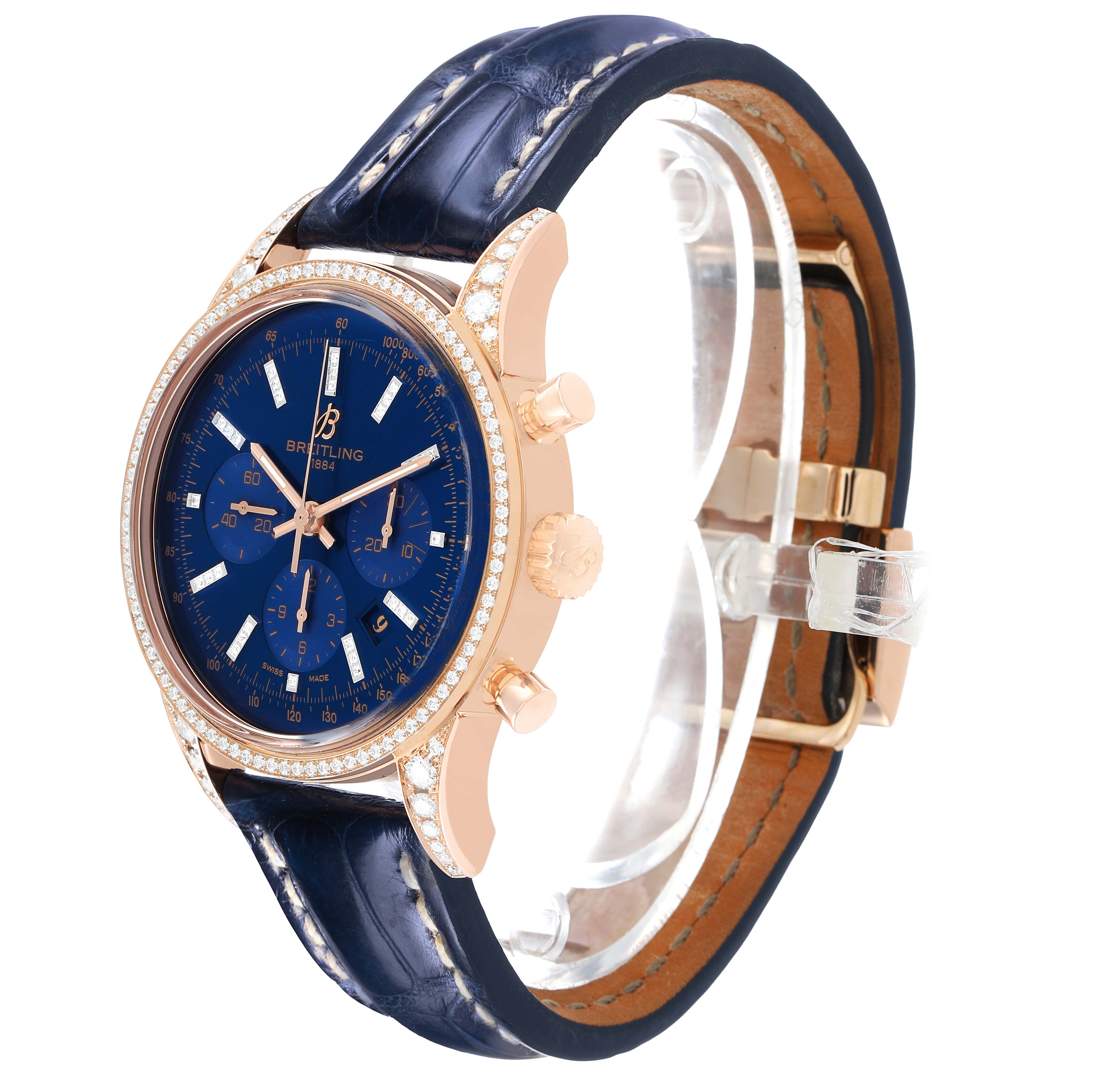 The Breitling Transocean RB0152 Men's Rose Gold Blue Dial watch is shown at a three-quarter angle, highlighting the bezel, dial, subdials, crown, and leather strap.