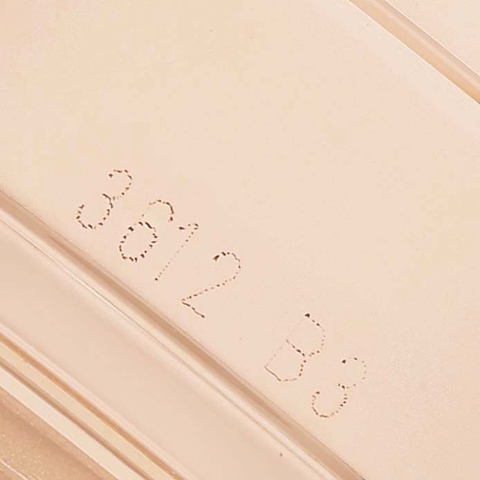 The image shows a close-up of the side engraving on a Breitling Transocean RB0152 Men's Rose Gold Blue Dial watch.
