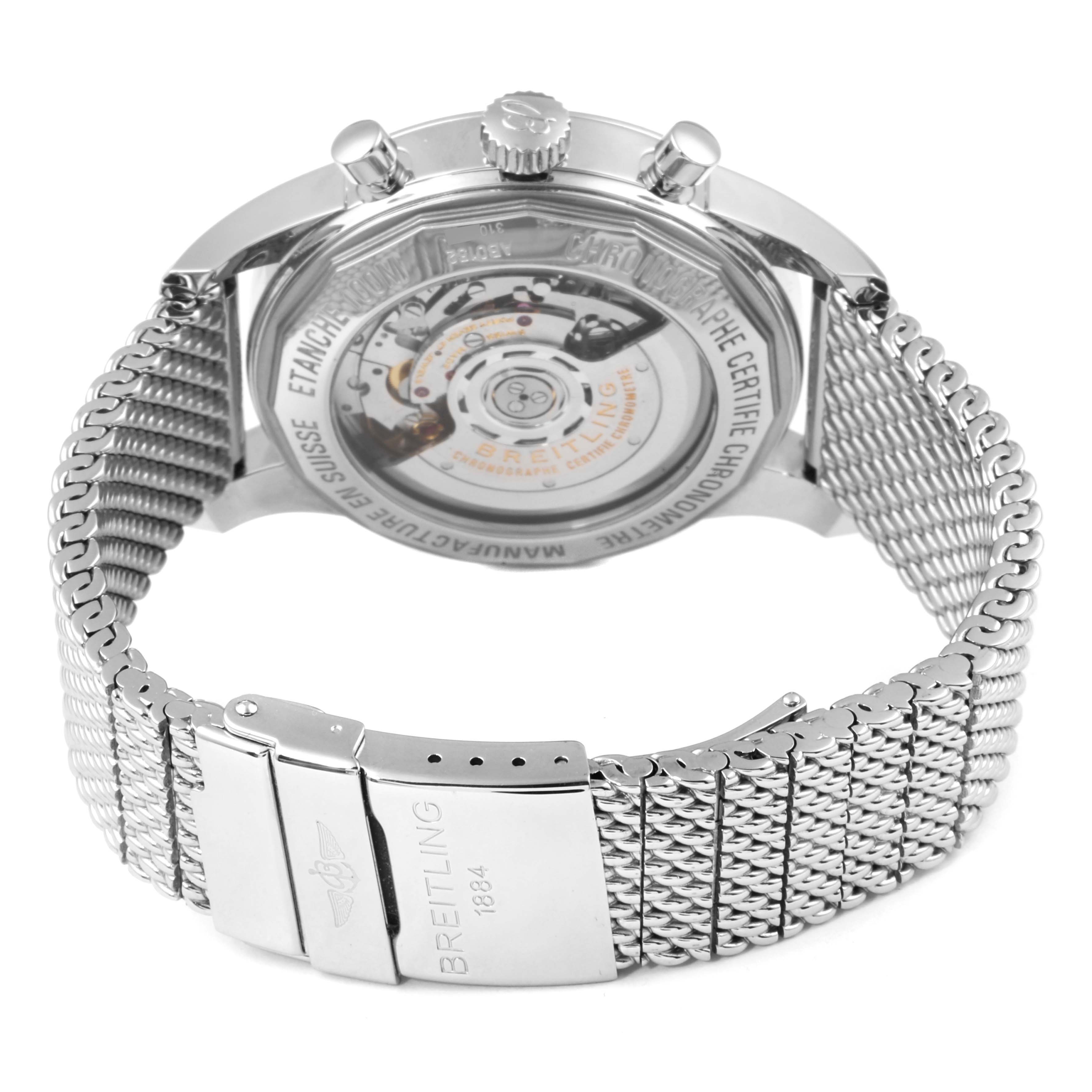 This image shows the back of a Breitling Transocean AB015212/G724 Men
s Stainless Steel Silver Dial AB015212/G724 Men
s Stainless Steel Silver Dial watch, highlighting its transparent case back, movement, and the metal mesh bracelet.