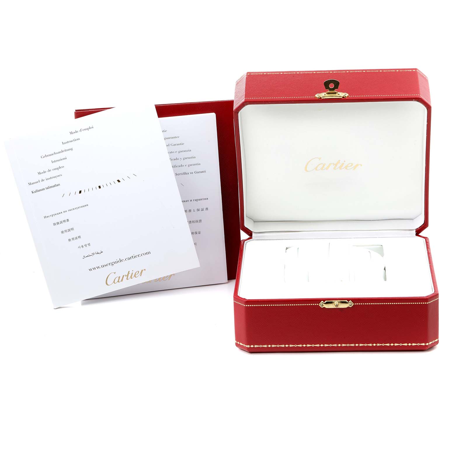 The image shows an open red Cartier box and accompanying documents for the Calibre de Cartier watch model by Cartier.