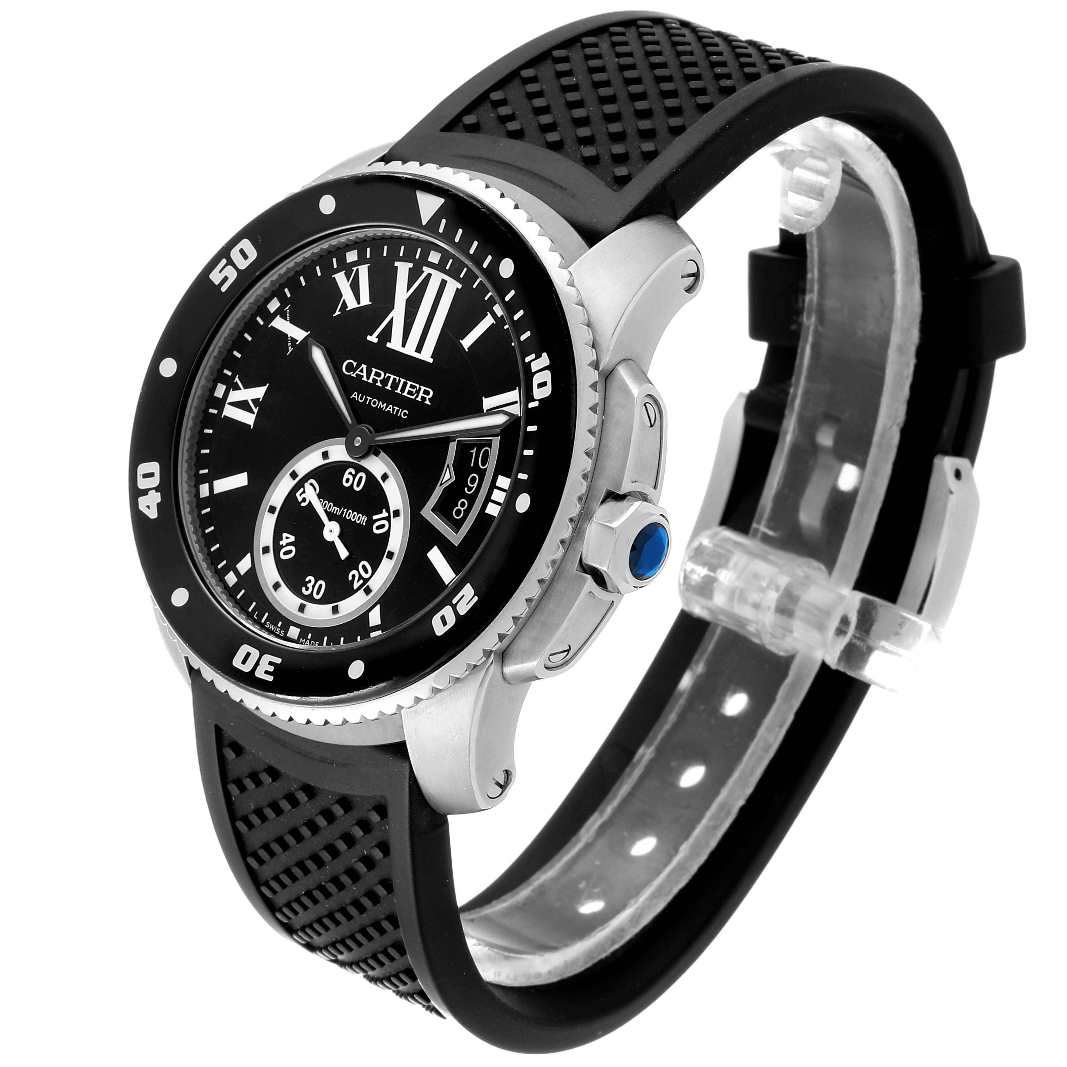 The Calibre de Cartier watch is shown from an angled side view, displaying the face, bezel, crown, and part of the black strap.