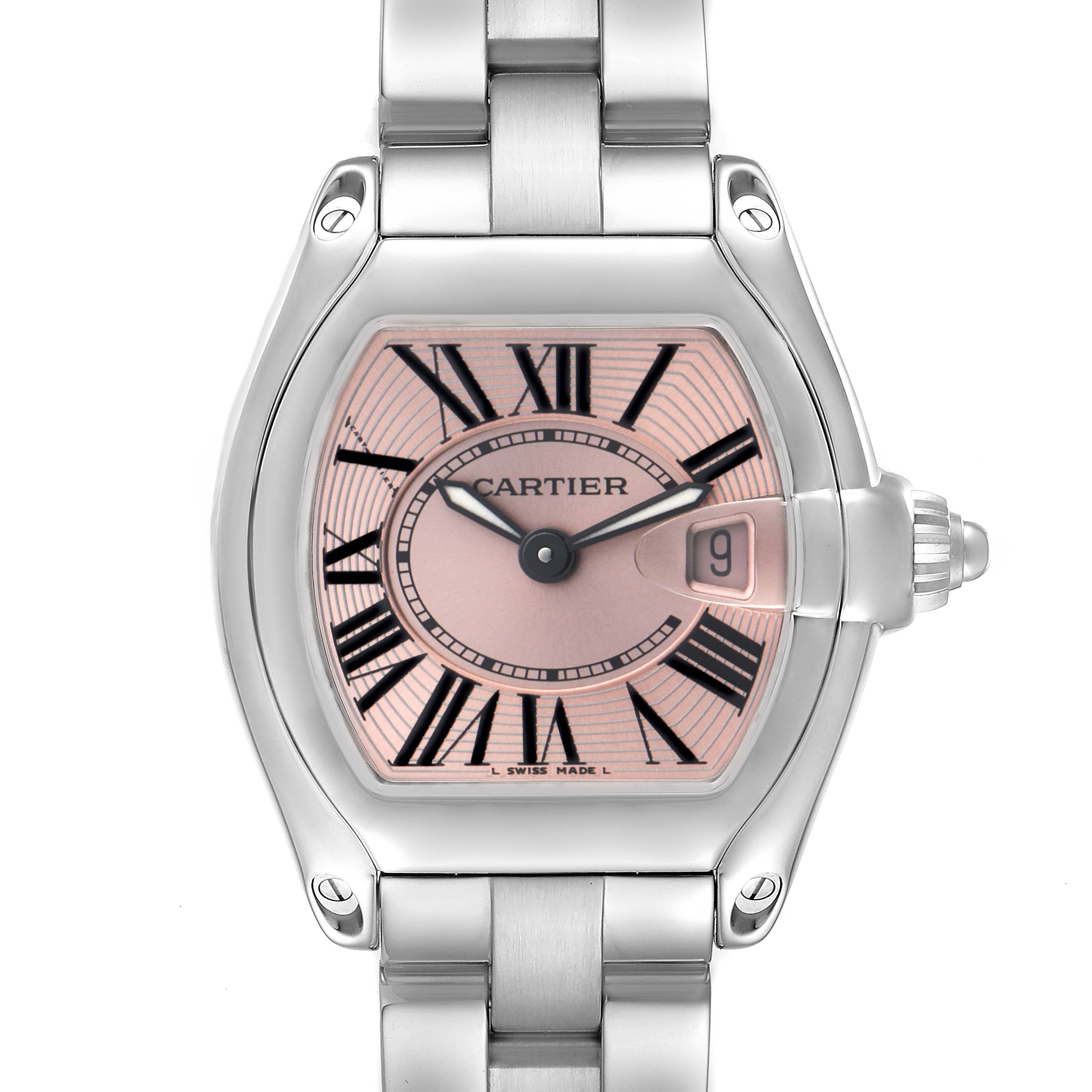 The image shows a Cartier Roadster W62017V3 Women's Stainless Steel Pink Dial W62017V3 Women's Stainless Steel Pink Dial watch face from the front, highlighting the dial, Roman numerals, and metal bracelet.