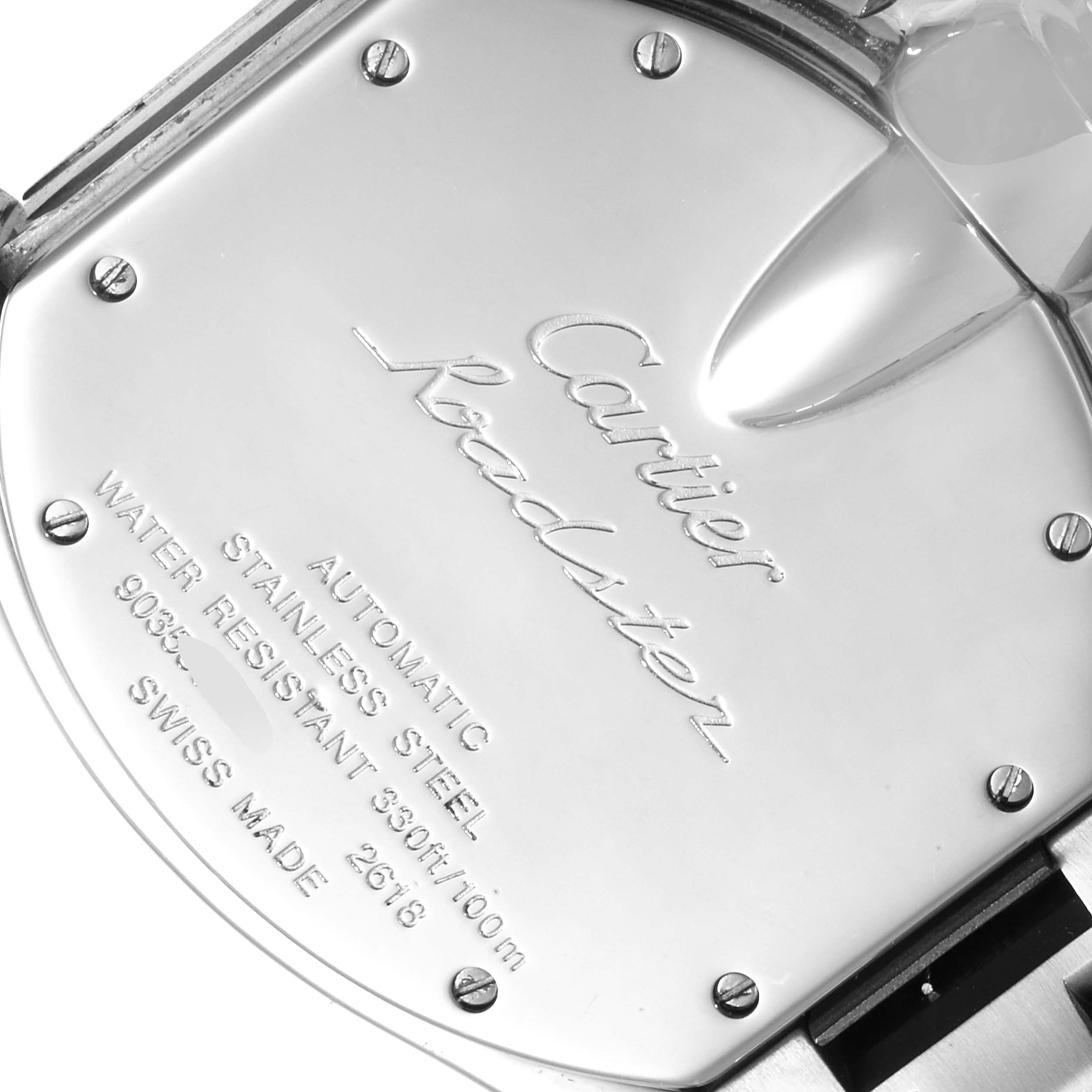 This image shows the backplate and case screws of a Cartier Roadster W62020X6 Men
s Stainless Steel Black Dial W62020X6 Men
s Stainless Steel Black Dial watch from a close-up angle.