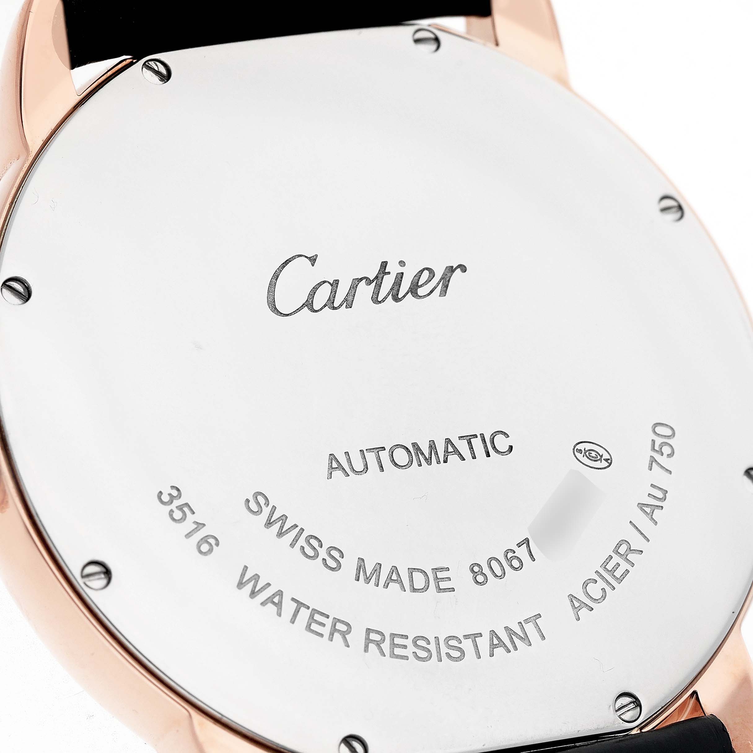 The image shows the back of a Cartier Ronde W6701009 Men's Rose Gold Silver Dial watch, highlighting the brand, model details, and metal engravings.