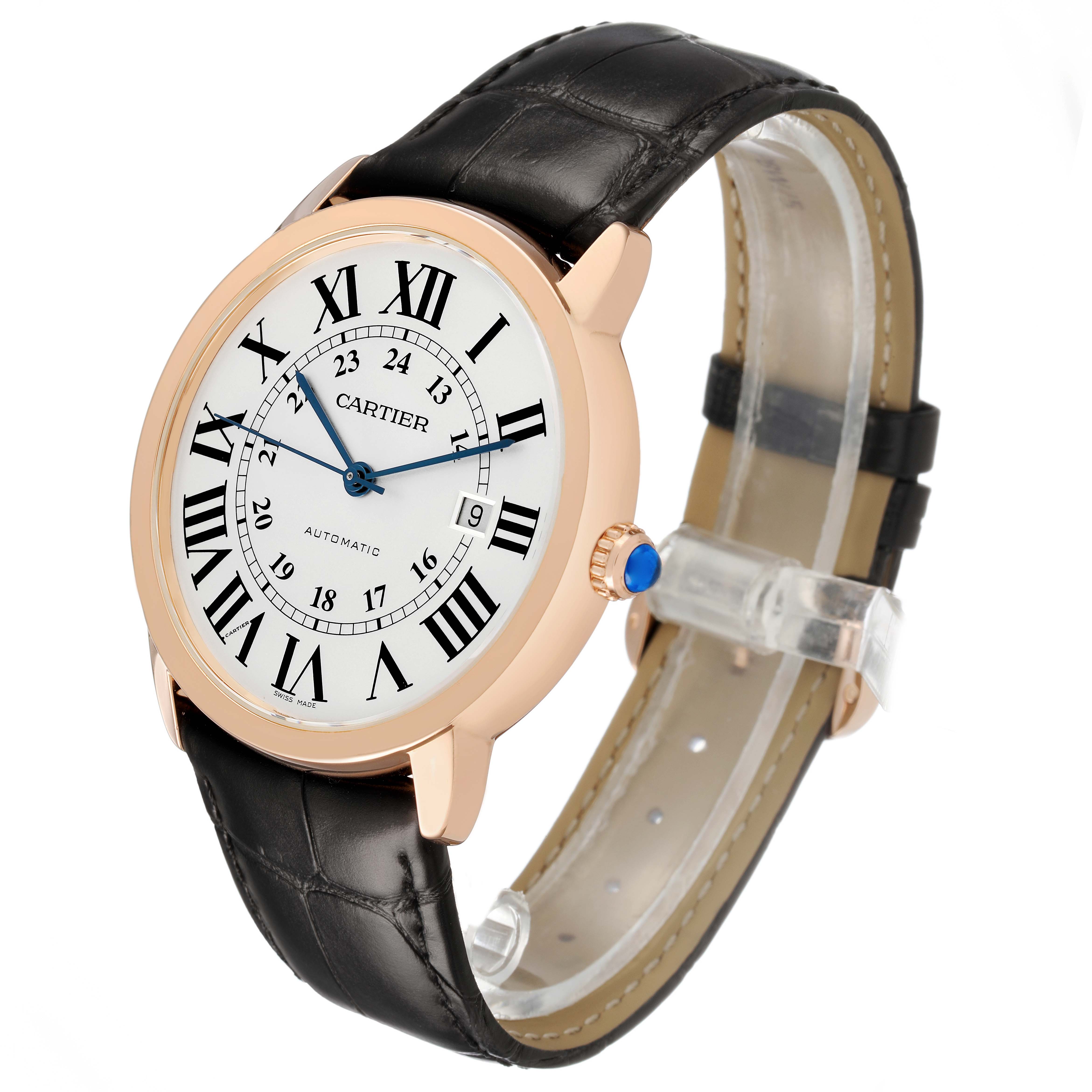 The Cartier Ronde W6701009 Men's Rose Gold Silver Dial watch is shown at an angled side view, highlighting its face, Roman numerals, date window, and leather strap.