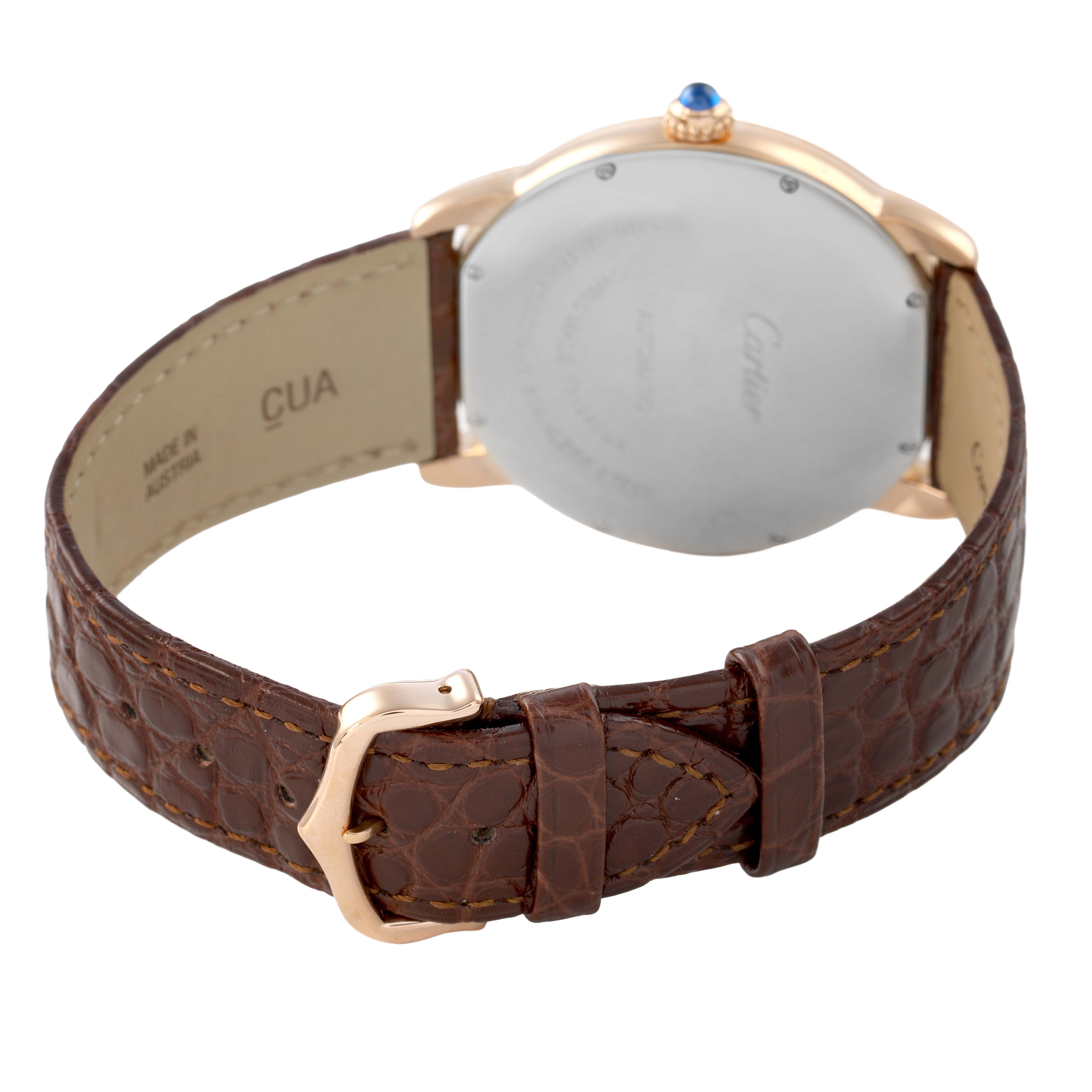 The image shows the back and side of the Cartier Ronde W6701009 Men's Rose Gold Silver Dial watch, highlighting the case back, crown, and leather strap with buckle.