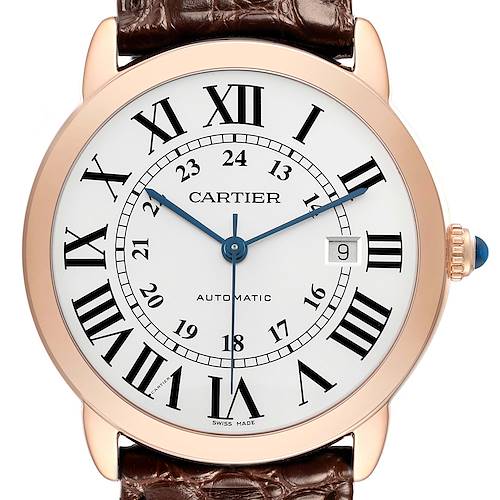 The Cartier Ronde W6701009 Men's Rose Gold Silver Dial model is shown from a front angle, displaying the face with Roman numerals, a date window, and a leather strap.