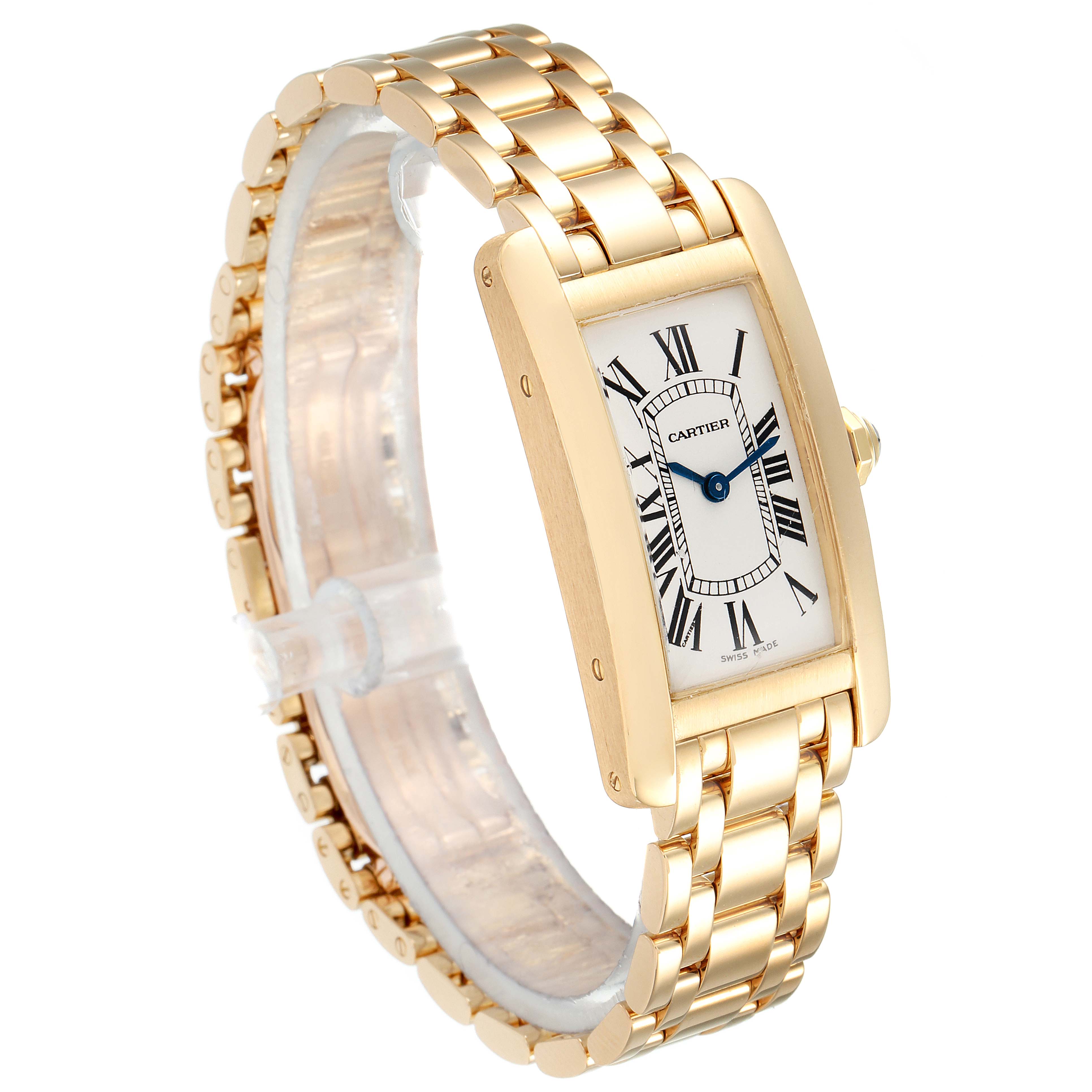 This image shows a Cartier Tank Americaine W26015K2 Women's Yellow Gold Silver Dial W26015K2 Women's Yellow Gold Silver Dial watch at a slight angle, showcasing its rectangular face and linked gold bracelet.