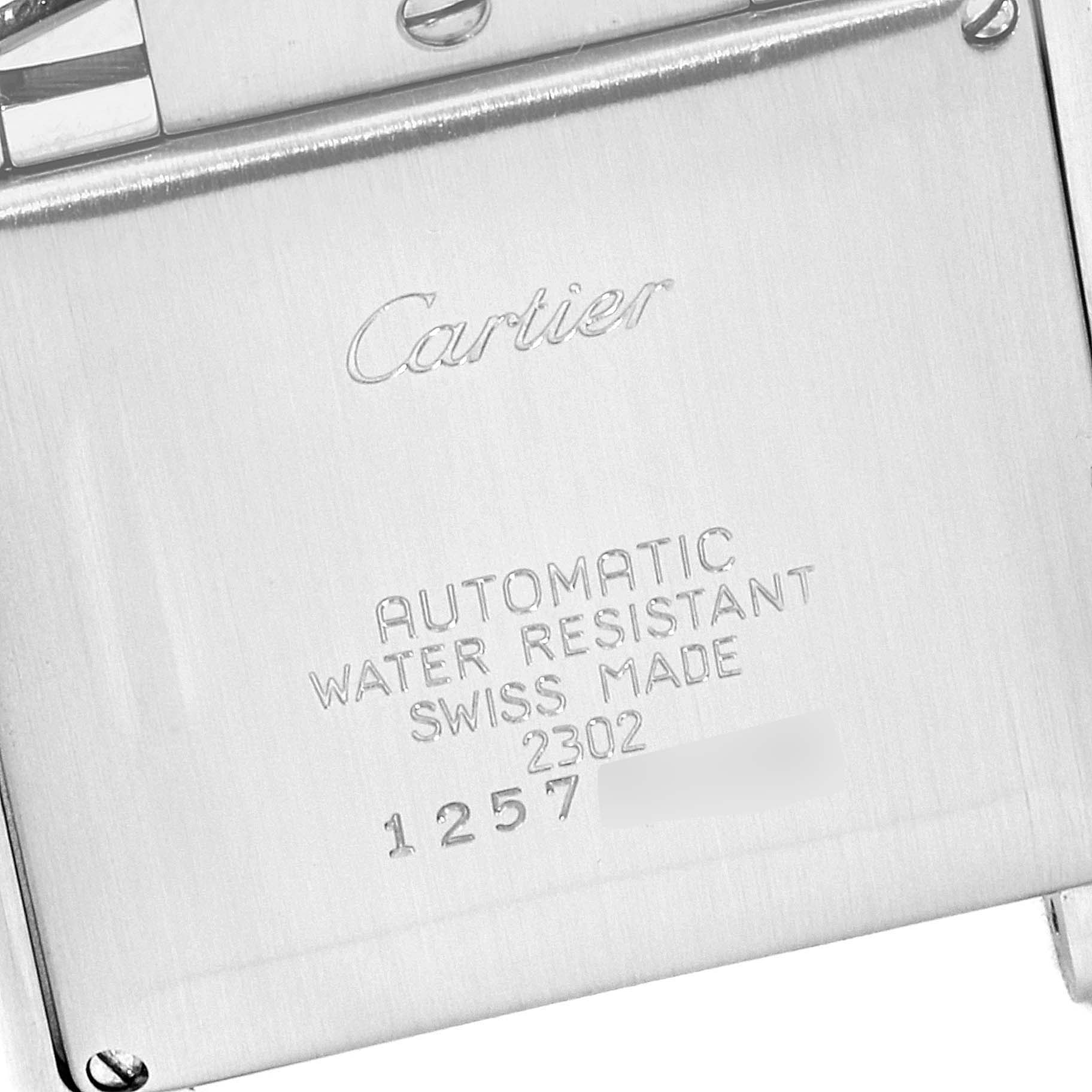 This image shows the engraved case back of a Cartier Tank Francaise W51002Q3 Men's Stainless Steel Silver Dial W51002Q3 Men's Stainless Steel Silver Dial watch.