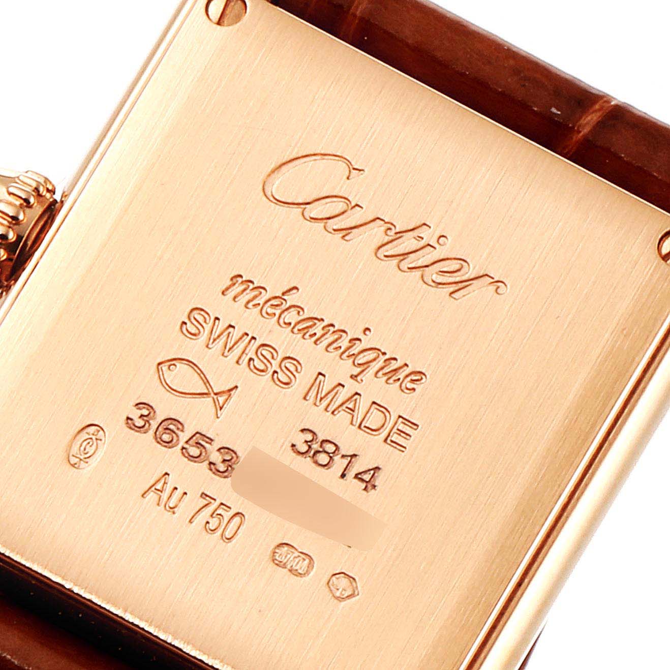 This image shows the back view of the Cartier Tank Louis WGTA0010  Women's Rose Gold Silver Dial WGTA0010  Women's Rose Gold Silver Dial watch, displaying its engravings and markings.